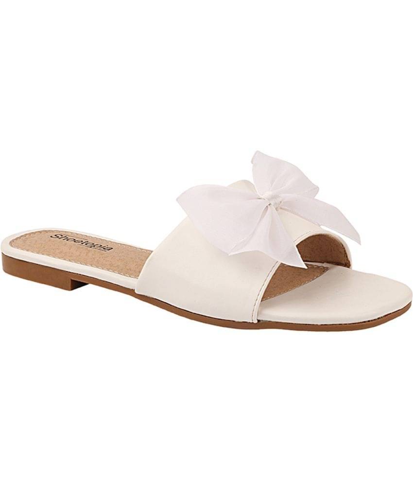     			Shoetopia White Flats