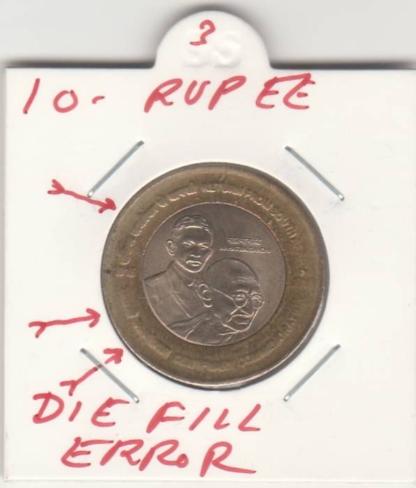     			NUMISMATTECLY  RARE AND COLLECTIBLE 10 R.S COMMOMORATIVE  C01N-GANDHI RETURN FROM SOUTH AFRICA ,CENTENARY COMMEMORATION -1915-2015- METAL -BI-METALIC, WITH DIE FILL ERROR,WEAK STRIKE ERROR,100% AUTHENTIC AND ORIGINAL C01N, IN UNC TYPE,