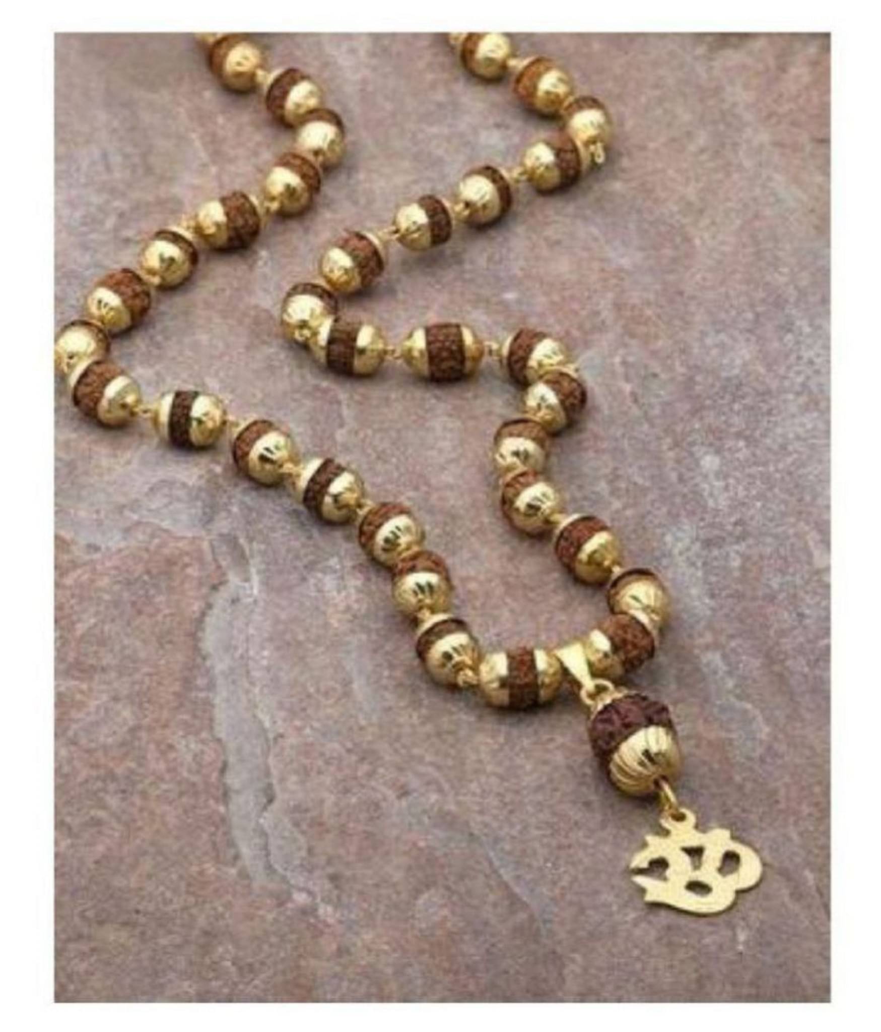     			Rudraksha cap mala with Om,Trishul rudraksha pendant