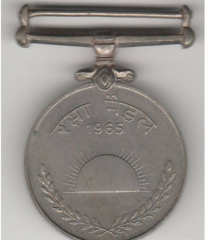     			NUMISMATTECLY  RARE AND COLLECTIBLE -RAKSHA MEDAL- YEAR-1965.IN EXTRA  VERY FINE CONDITION , IN THE BOTTAM WHO GET THIS MEDAL ALSO PRINTED NAME ,MAJ. I.L.ARORA.CHECK PICTURE CAREFFULLY BEFORE ORDER PLEASE DONT PLACE FAKE  ORDER.WIGHT-29 GRAMS.