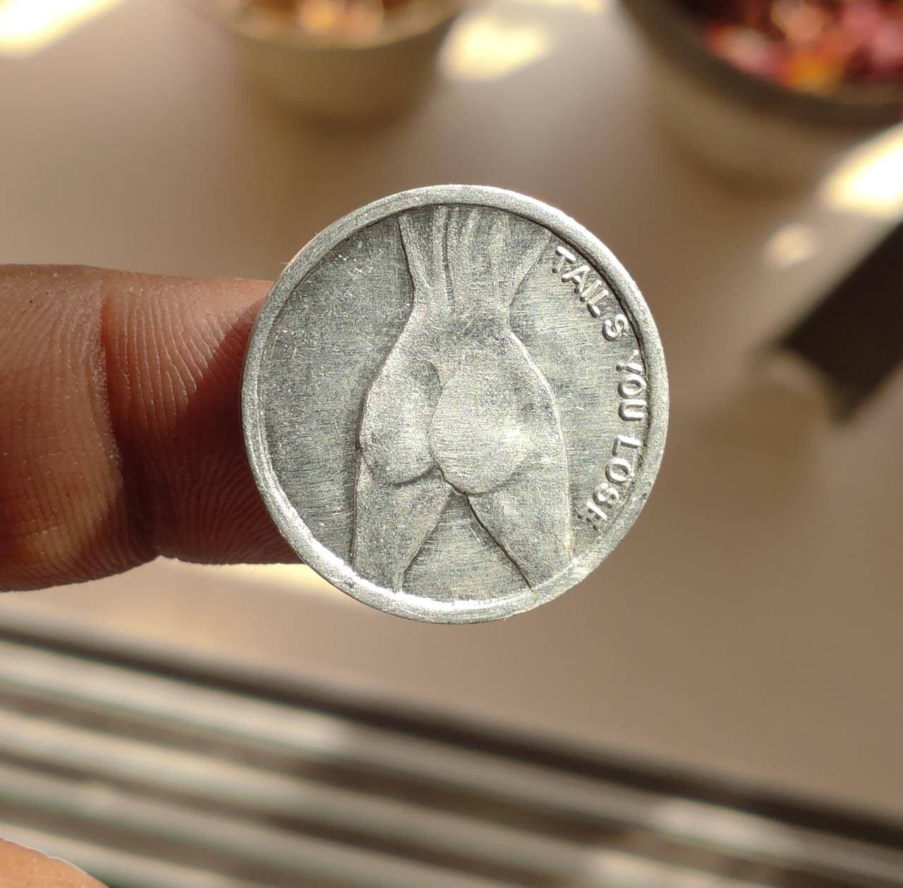     			EROTIC COIN TOSS COIN IN UNC CONDITION SMALL SIZE