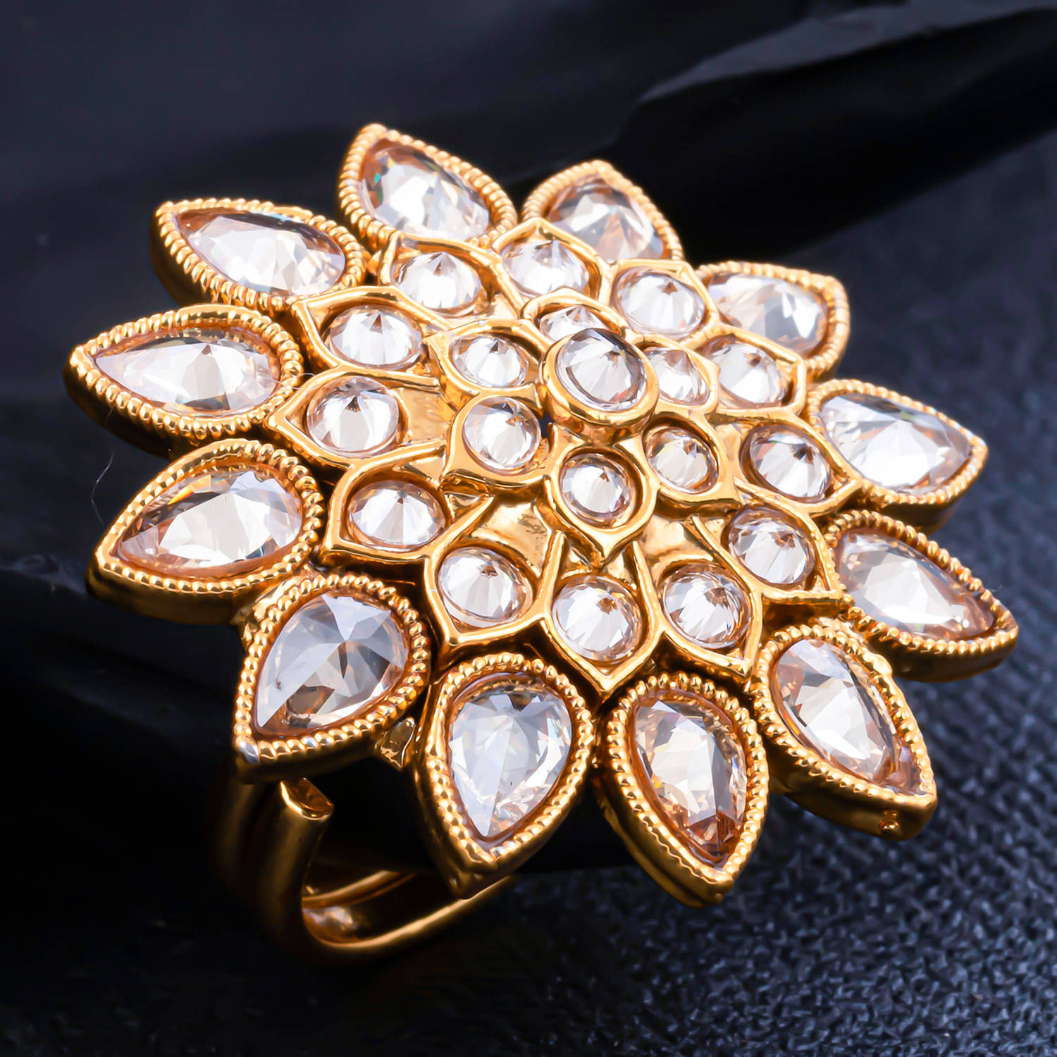 Sukkhi Sparkling Eye-CatchyFloral Gold Plated Colour Stone Adjustable Ring For Women Sukkhi Sparkling Eye-CatchyFloral Gold Plated Colour Stone Adjustable Ring For Women
