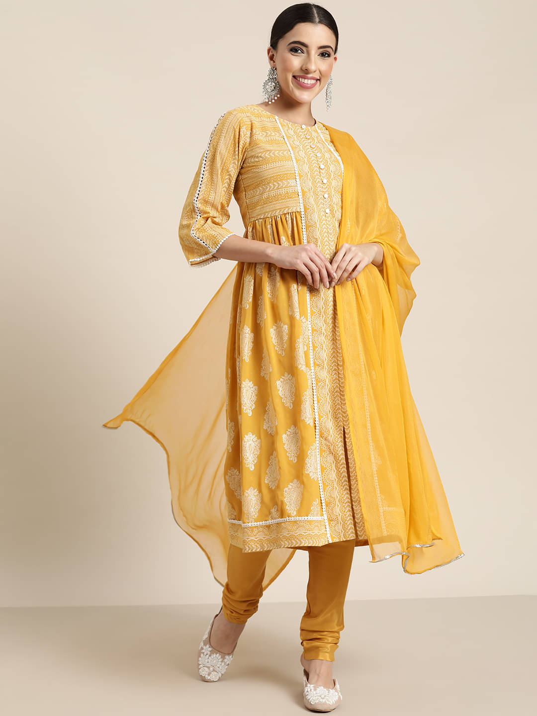 Juniper - Yellow Tiered Flared Georgette Women's Stitched Salwar Suit ( Pack of 1 ) Juniper - Yellow Tiered Flared Georgette Women's Stitched Salwar Suit ( Pack of 1 )