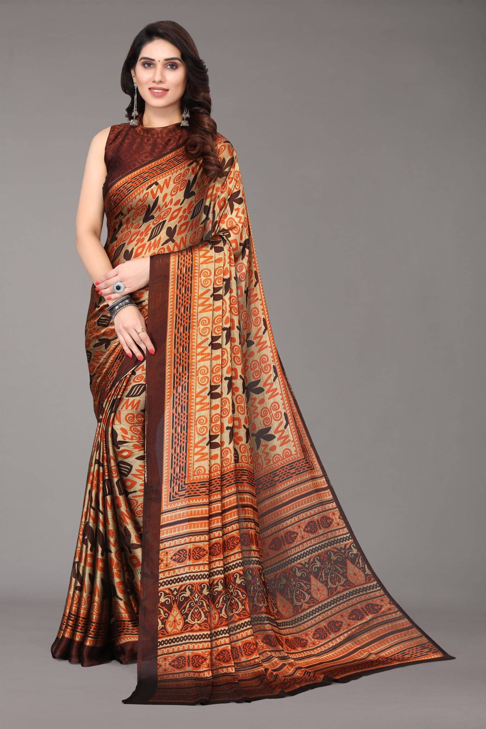 FABMORA Chiffon Printed Saree With Unstitched Blouse Piece ( Coffee )     			FABMORA Chiffon Printed Saree With Unstitched Blouse Piece ( Coffee )