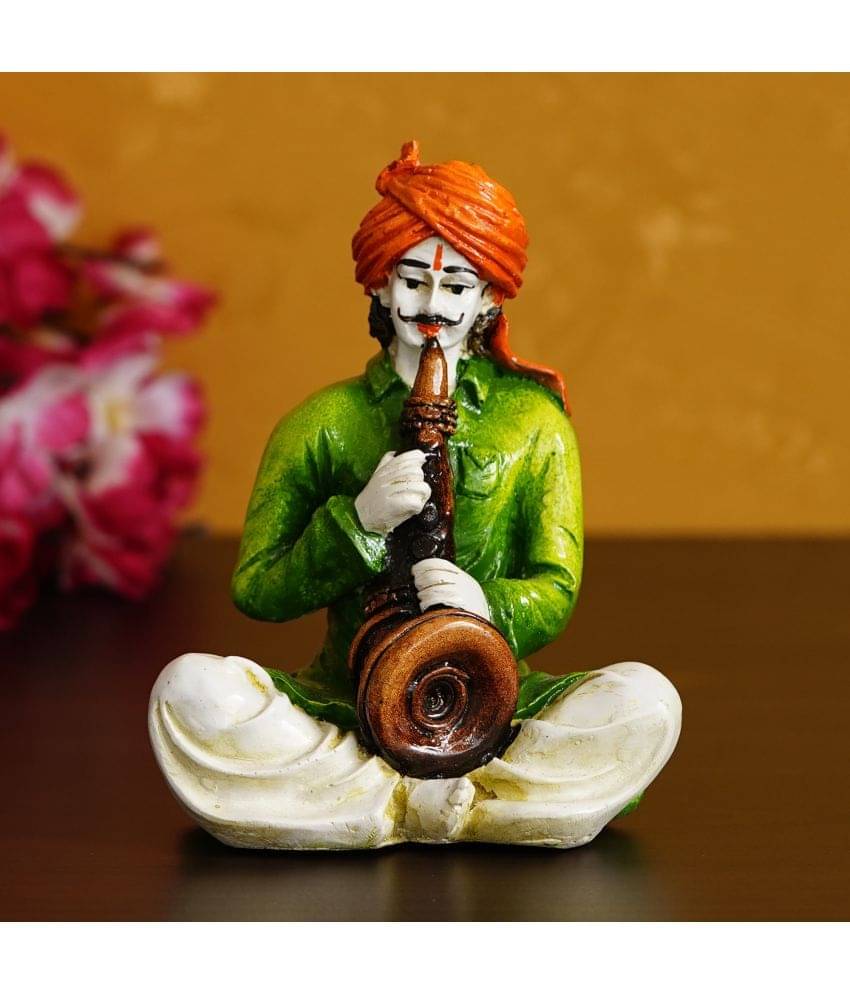 eCraftIndia Green & White Rajasthani Man Playing Musical Instrument Showpiece     			eCraftIndia Green & White Rajasthani Man Playing Musical Instrument Showpiece