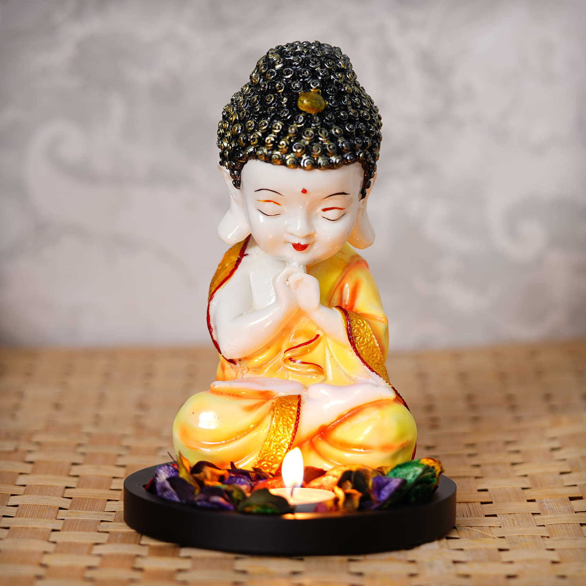 eCraftIndia Orange & White Praying Monk Buddha With Wooden Base Fragranced Petals & Tealight Showpiece eCraftIndia Orange & White Praying Monk Buddha With Wooden Base Fragranced Petals & Tealight Showpiece