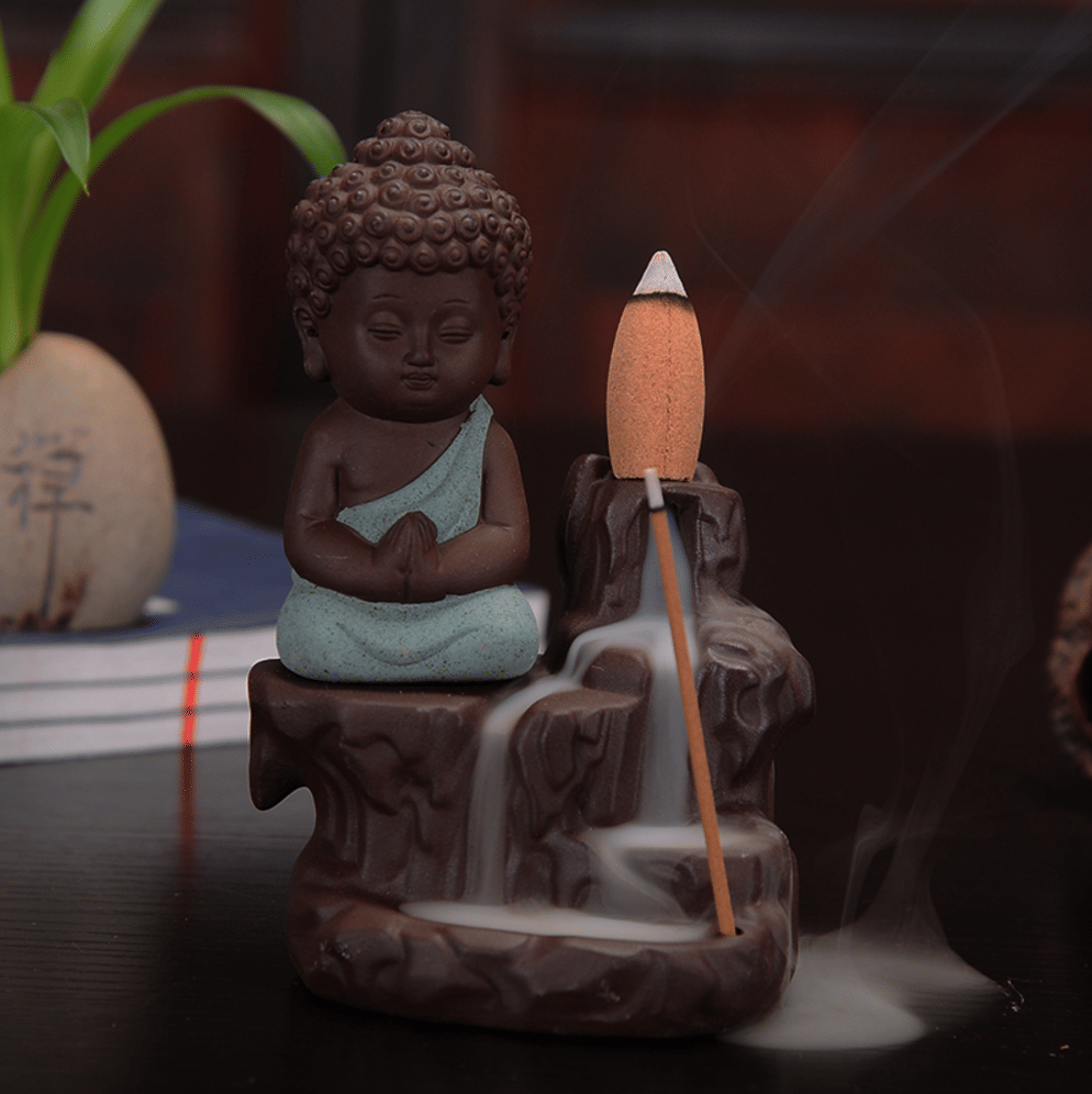 eCraftIndia Meditating Monk Buddha Decorative Showpiece with 10 free Smoke Backflow Scented Cone Incenses eCraftIndia Meditating Monk Buddha Decorative Showpiece with 10 free Smoke Backflow Scented Cone Incenses