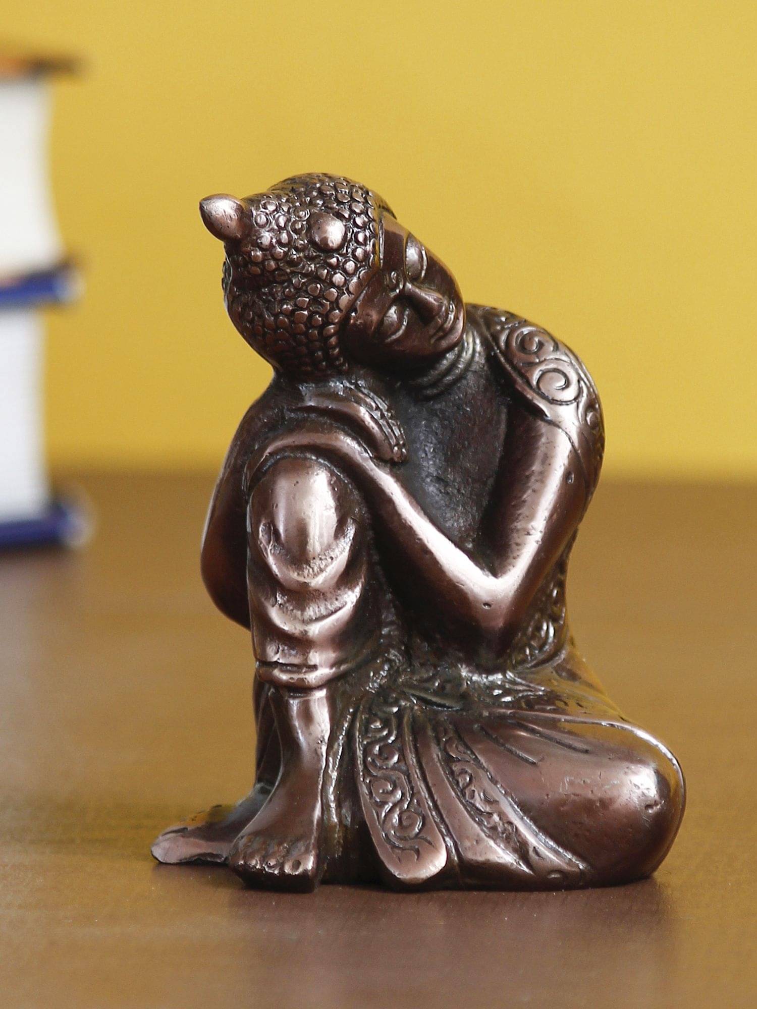 eCraftIndia Copper-toned Resting Buddha on Knee Showpiece     			eCraftIndia Copper-toned Resting Buddha on Knee Showpiece