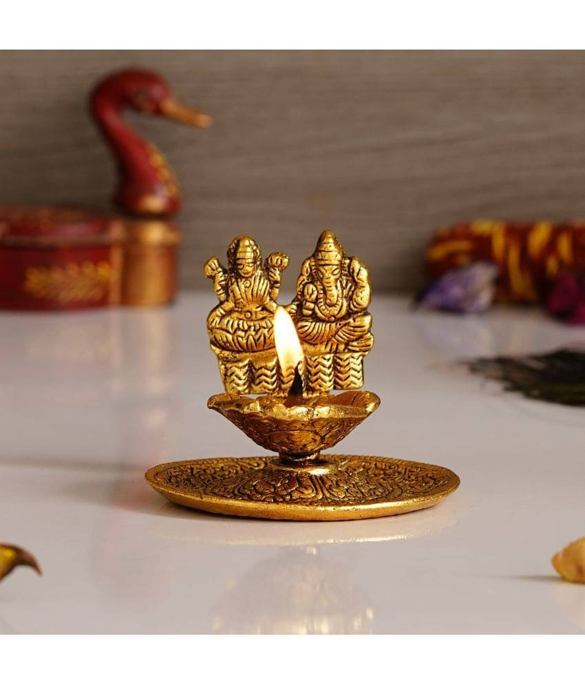 eCraftIndia Handcrafted Goddess Laxmi & Lord Ganesha Golden Metal Diya Showpiece     			eCraftIndia Handcrafted Goddess Laxmi & Lord Ganesha Golden Metal Diya Showpiece