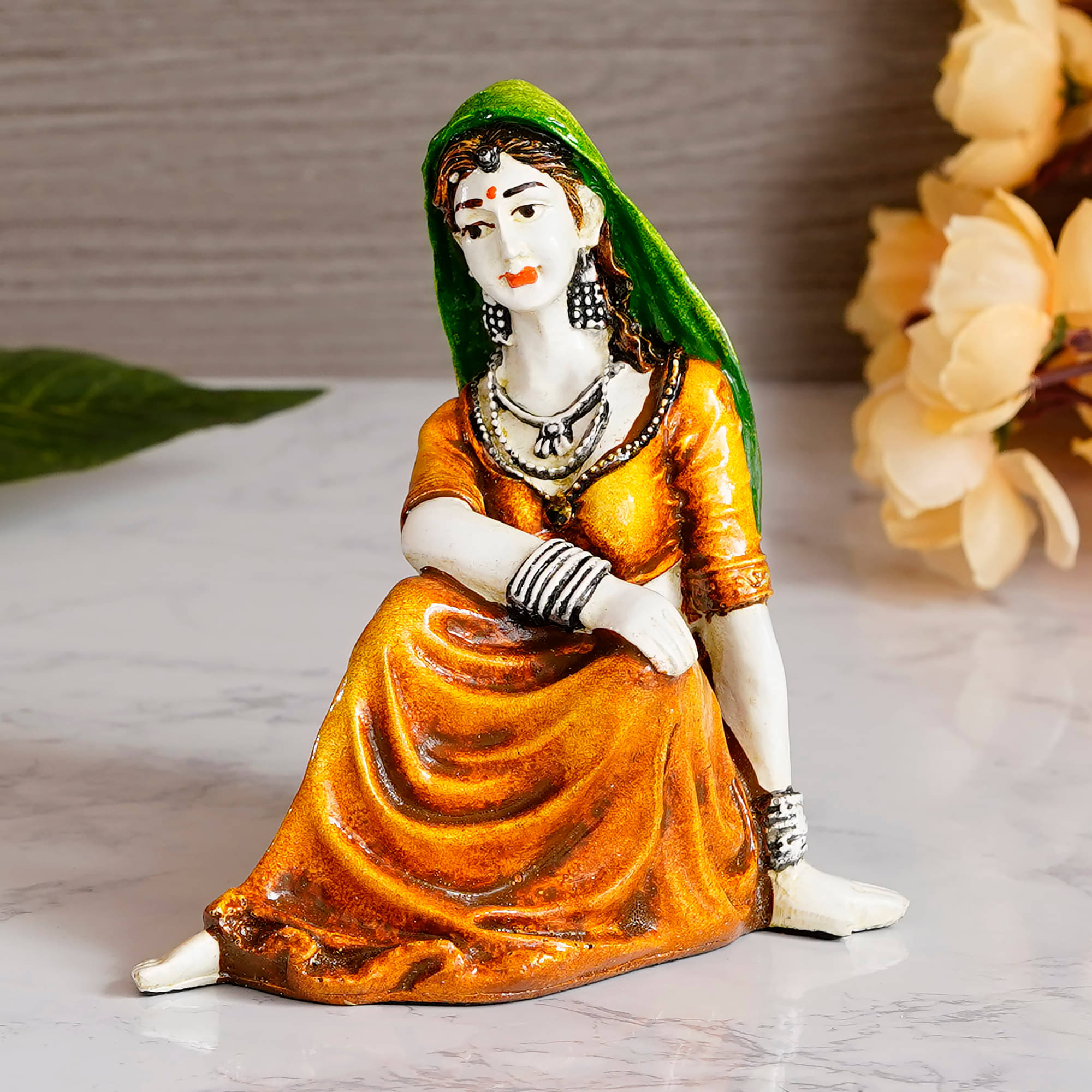 eCraftIndia Green & Orange Resting Rajasthani Lady Handcrafted Decorative Showpiece     			eCraftIndia Green & Orange Resting Rajasthani Lady Handcrafted Decorative Showpiece