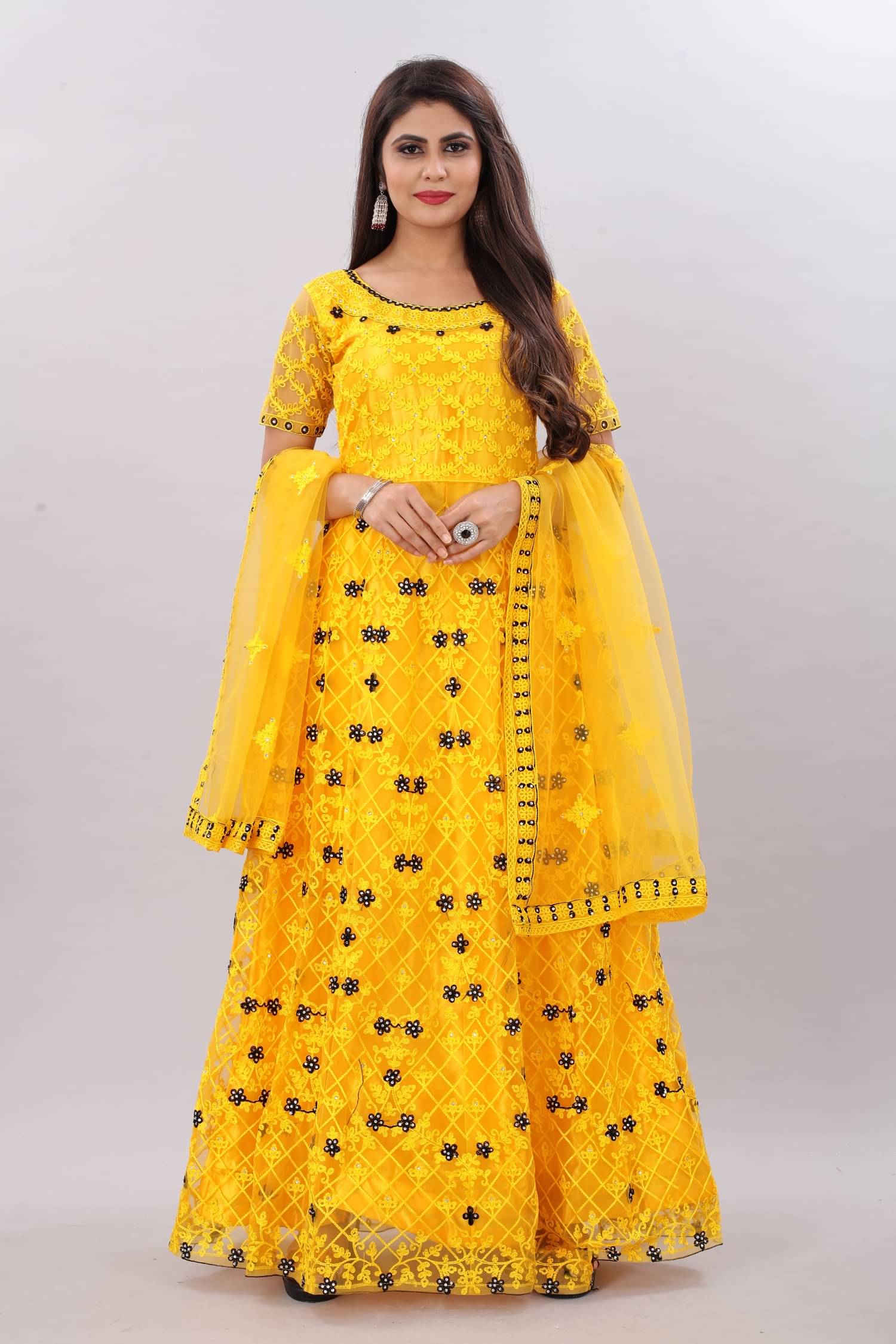 Apnisha - Yellow Anarkali Net Women's Semi Stitched Ethnic Gown ( Pack of 1 )     			Apnisha - Yellow Anarkali Net Women's Semi Stitched Ethnic Gown ( Pack of 1 )