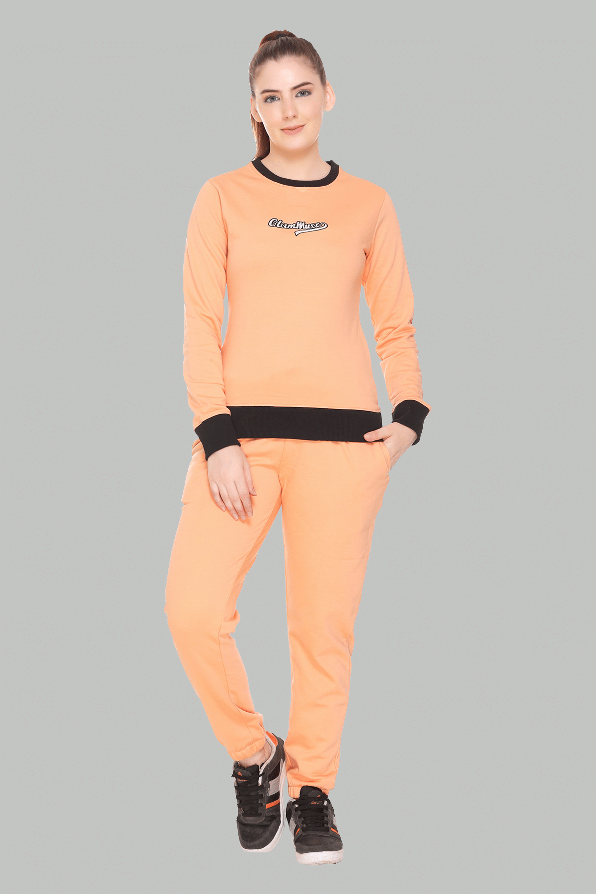    			RF RAVES Peach Fleece Solid Tracksuit - Pack of 1