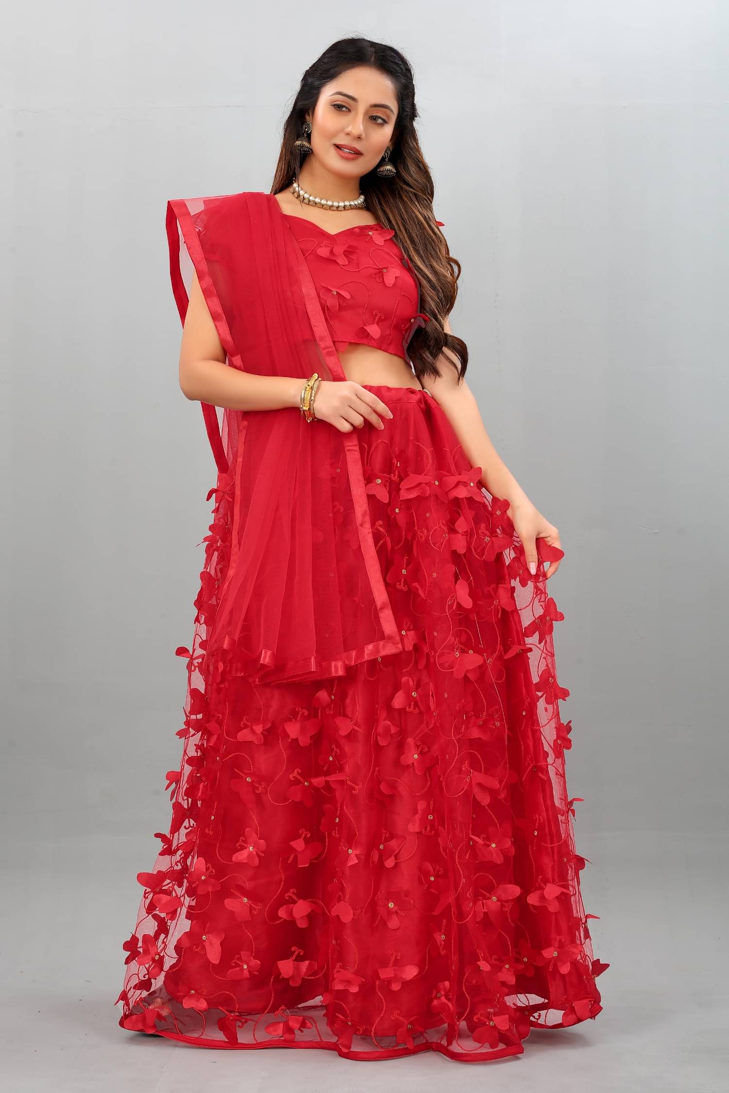 Apnisha Red Net A-line Semi Stitched Lehenga Apnisha Red Net A-line Semi Stitched Lehenga