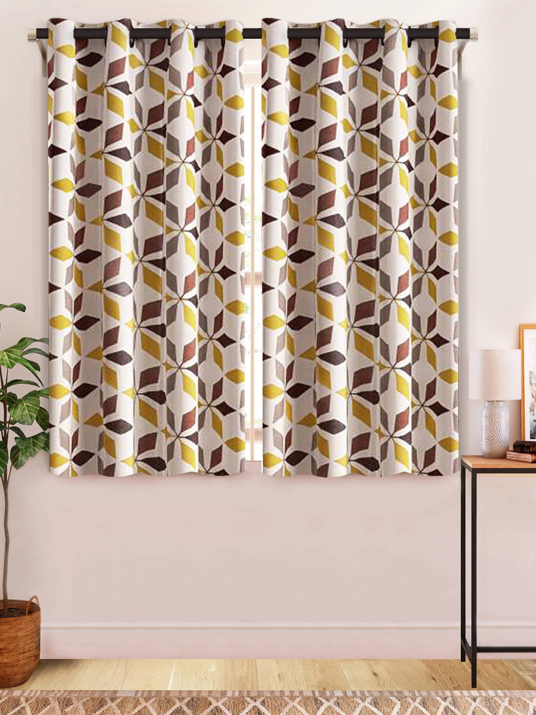 Home Candy Ethnic Semi-Transparent Eyelet Curtain 5 ft ( Pack of 2 ) - Brown     			Home Candy Ethnic Semi-Transparent Eyelet Curtain 5 ft ( Pack of 2 ) - Brown