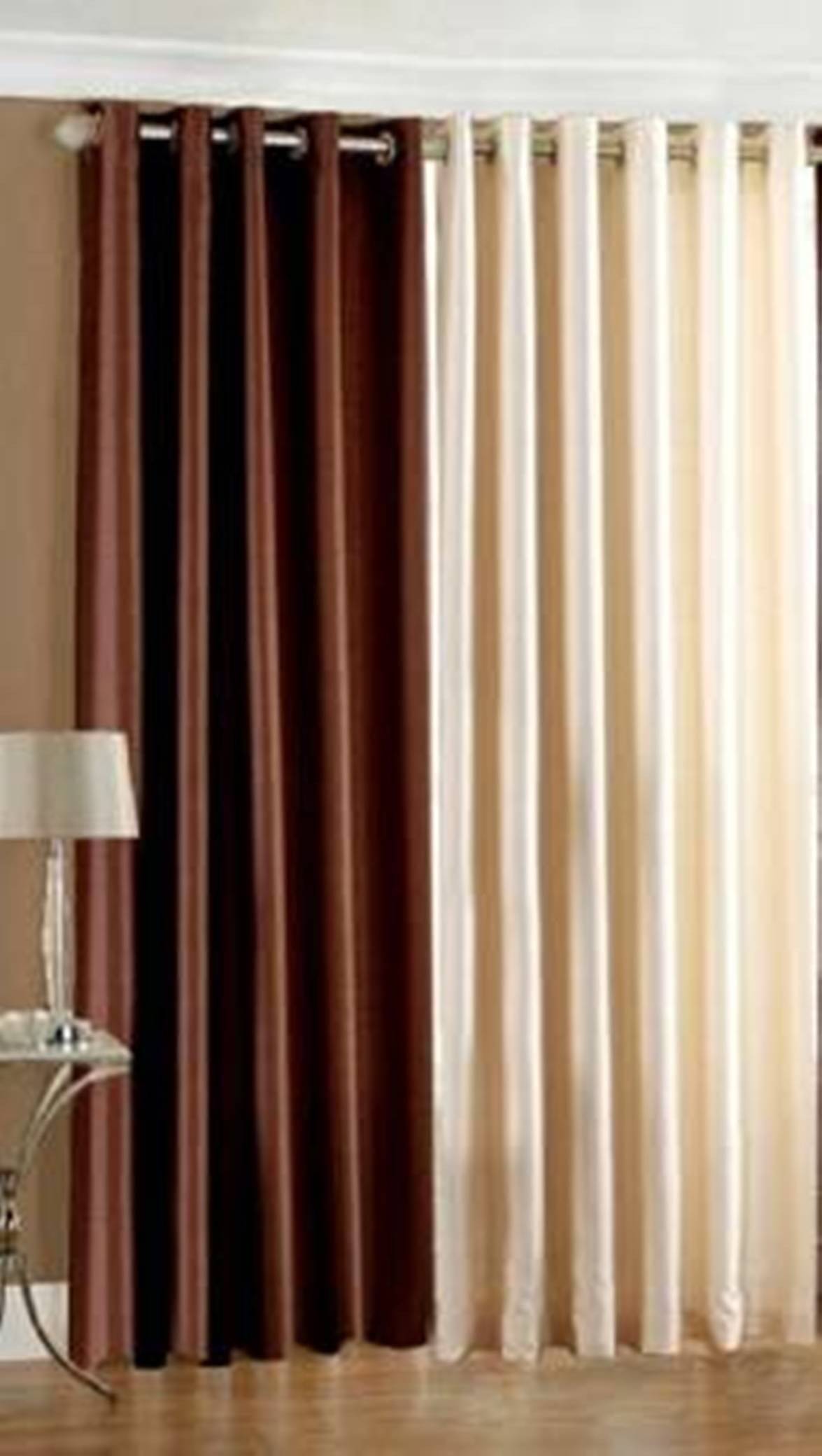 N2C Home Solid Semi-Transparent Eyelet Curtain 9 ft ( Pack of 2 ) - Brown N2C Home Solid Semi-Transparent Eyelet Curtain 9 ft ( Pack of 2 ) - Brown