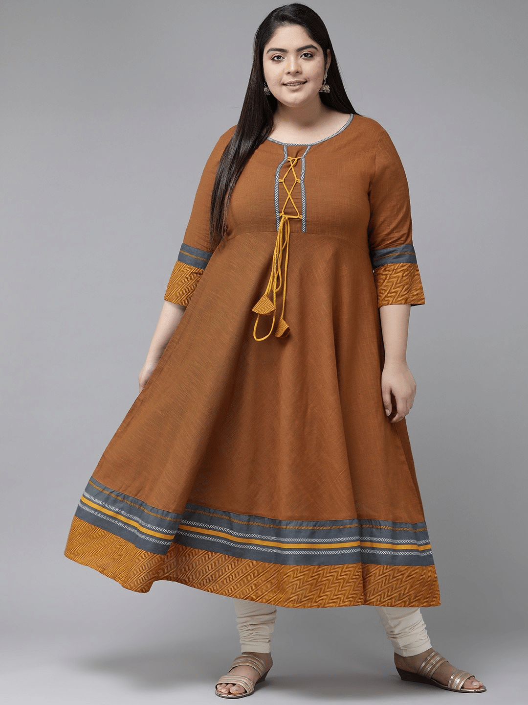 Yash Gallery Cotton Printed Anarkali Women's Kurti - Brown ( Pack of 1 ) Yash Gallery Cotton Printed Anarkali Women's Kurti - Brown ( Pack of 1 )