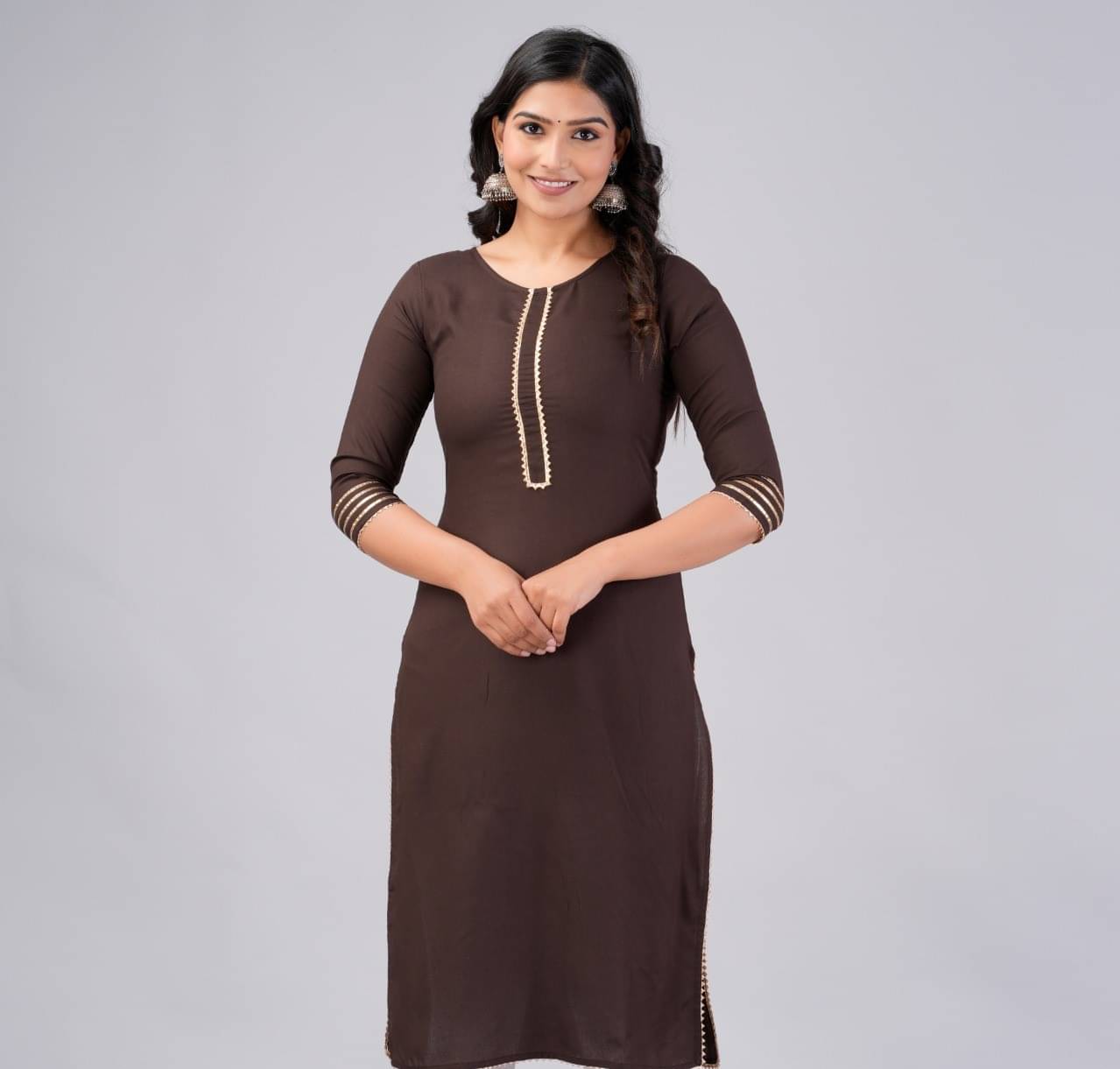 MAUKA Rayon Solid Straight Women's Kurti - Brown ( Pack of 1 )     			MAUKA Rayon Solid Straight Women's Kurti - Brown ( Pack of 1 )