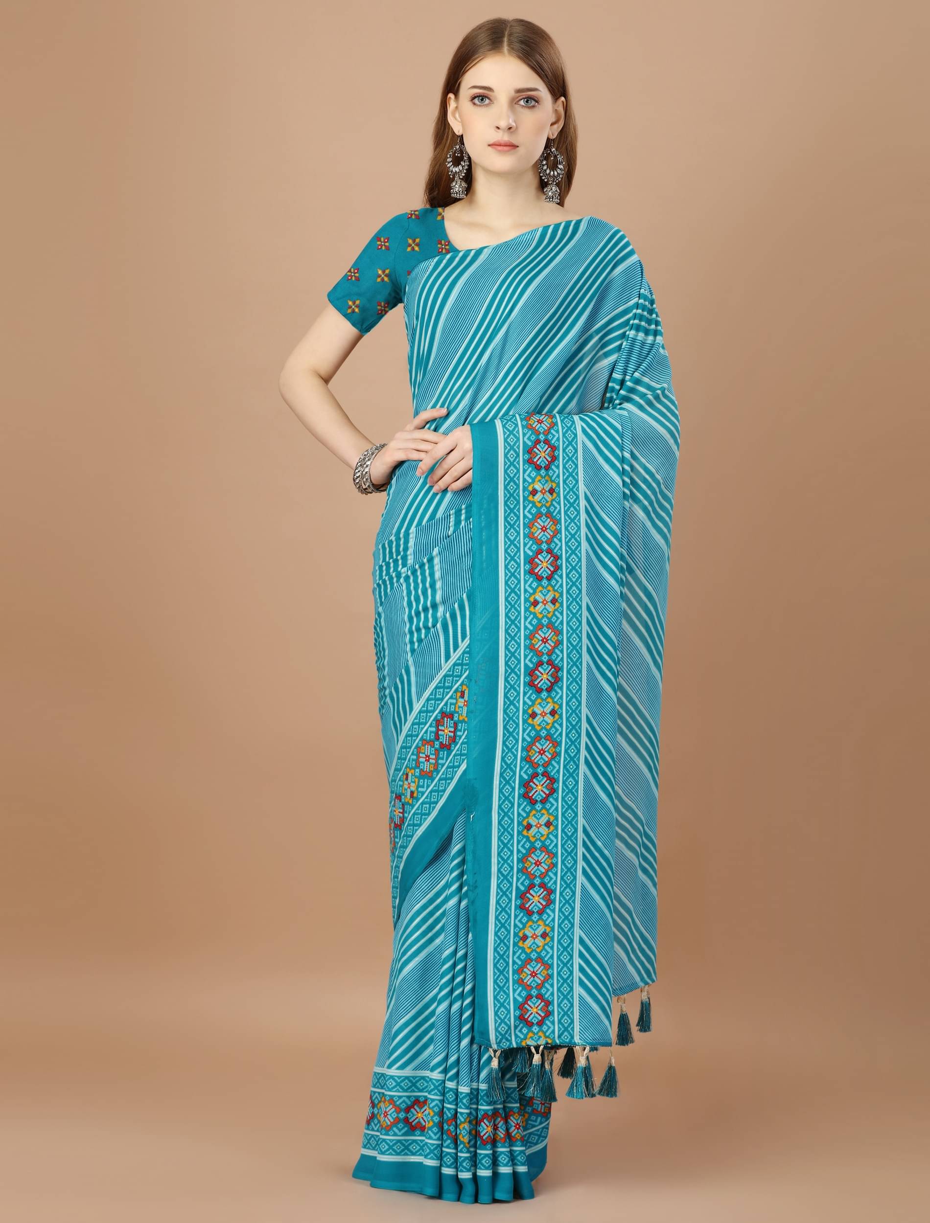 Rekha Maniyar Georgette Striped Saree With Unstitched Blouse Piece ( Blue ) Rekha Maniyar Georgette Striped Saree With Unstitched Blouse Piece ( Blue )