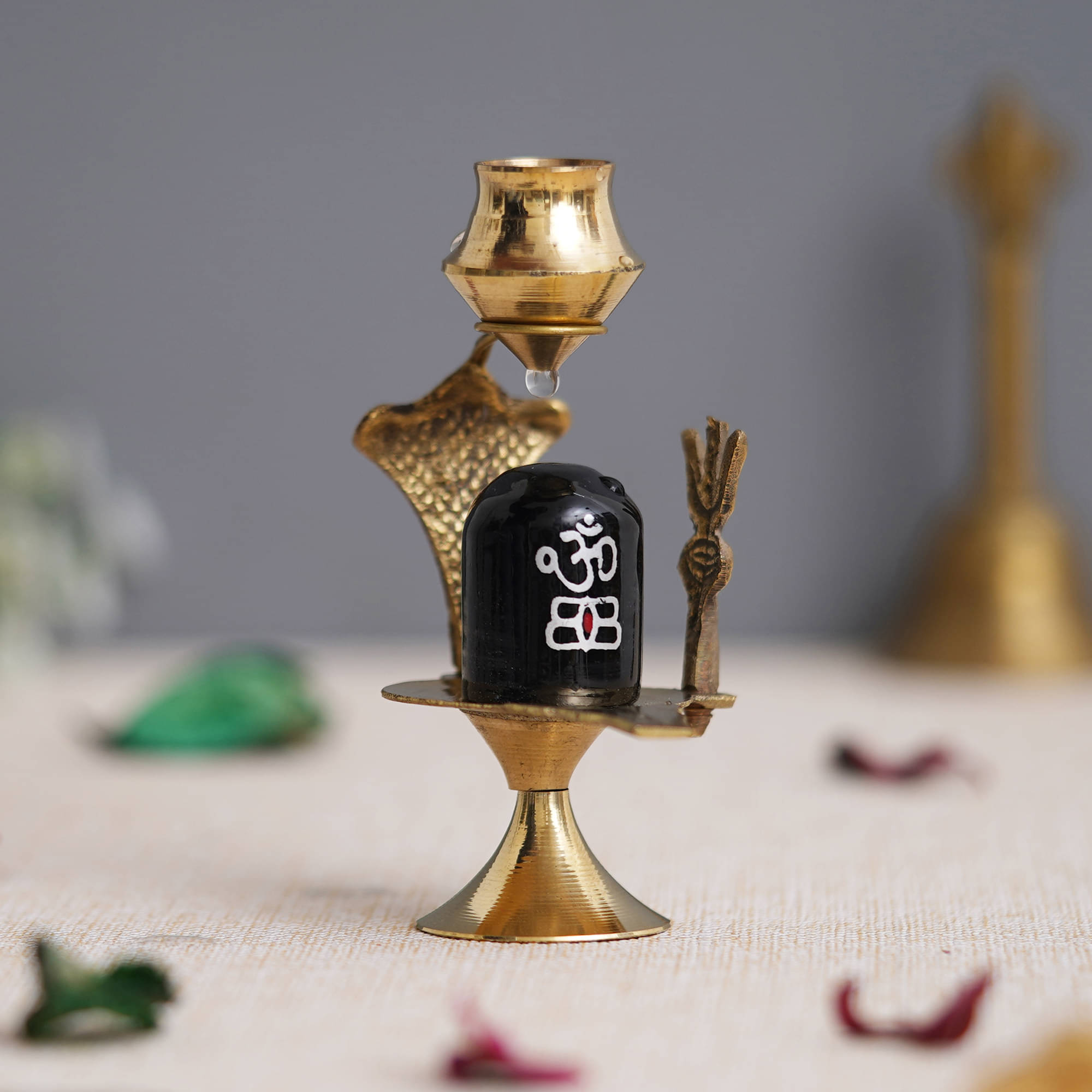     			eCraftIndia Brown & Black Textured Shivling & Naag Devta Metal Idol Showpieces