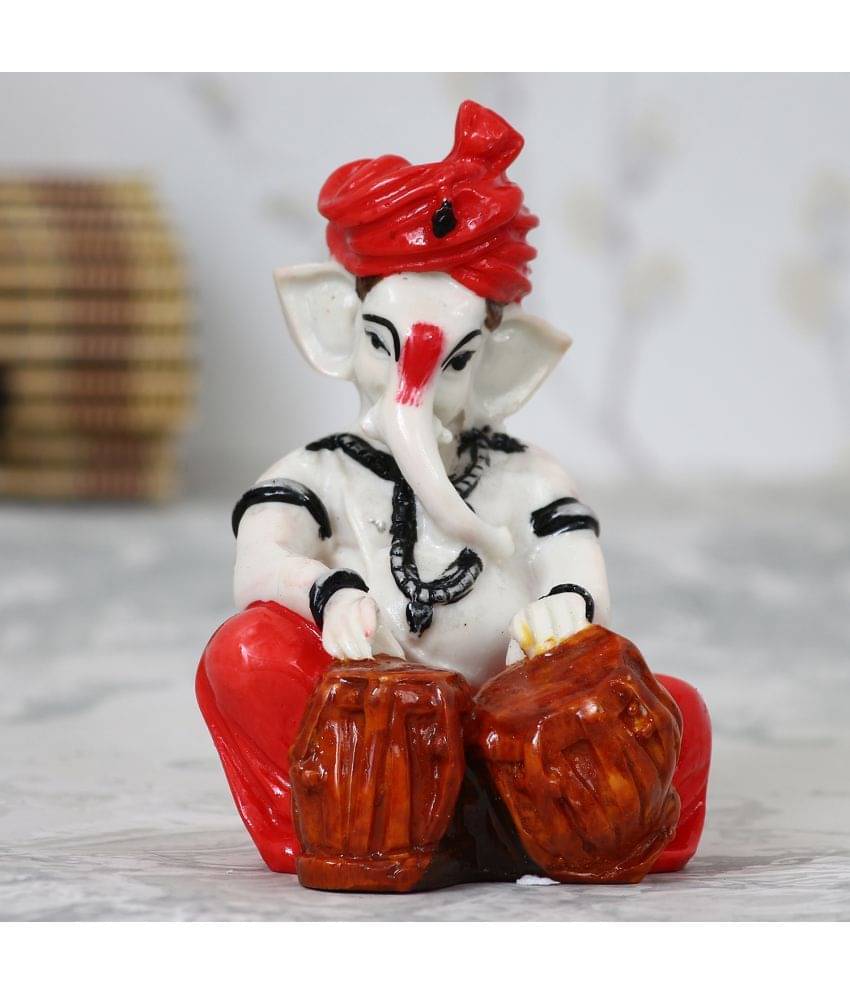 eCraftIndia Red & White Handcrafted Lord Ganesha Playing Tabla Showpiece     			eCraftIndia Red & White Handcrafted Lord Ganesha Playing Tabla Showpiece