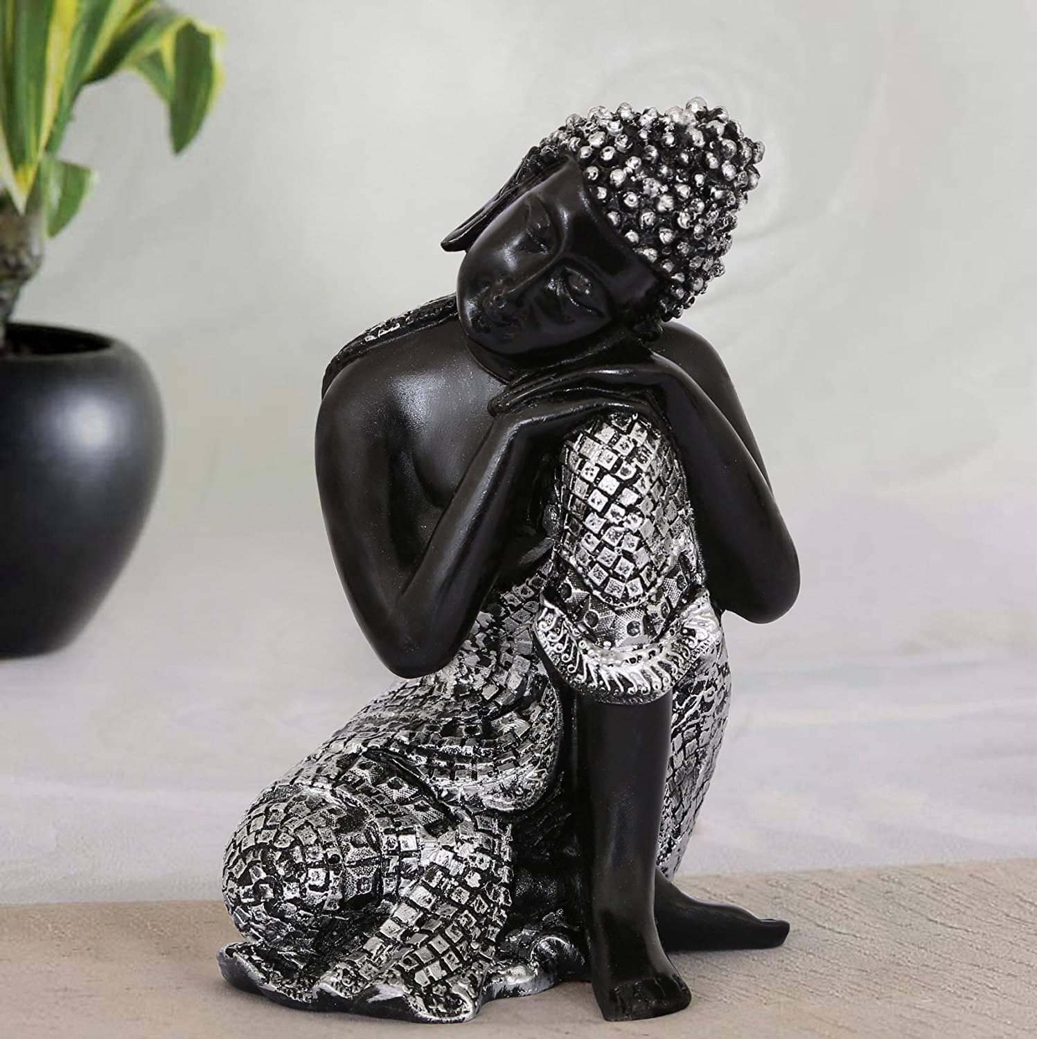     			eCraftIndia Silver-Toned & Black Resting Buddha on Knee Idol