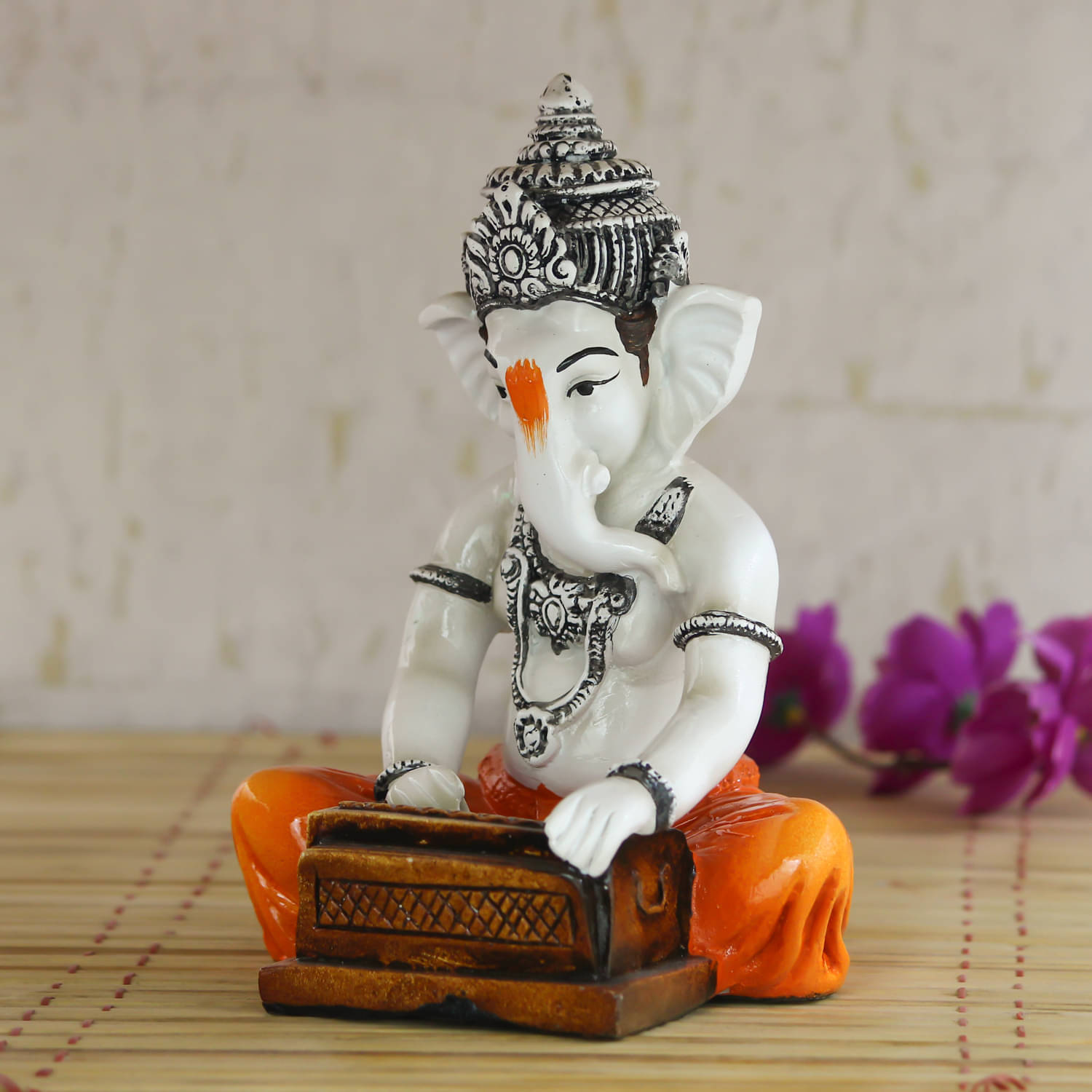 eCraftIndia Orange & White Lord Ganesha Playing Harmonium Showpiece     			eCraftIndia Orange & White Lord Ganesha Playing Harmonium Showpiece