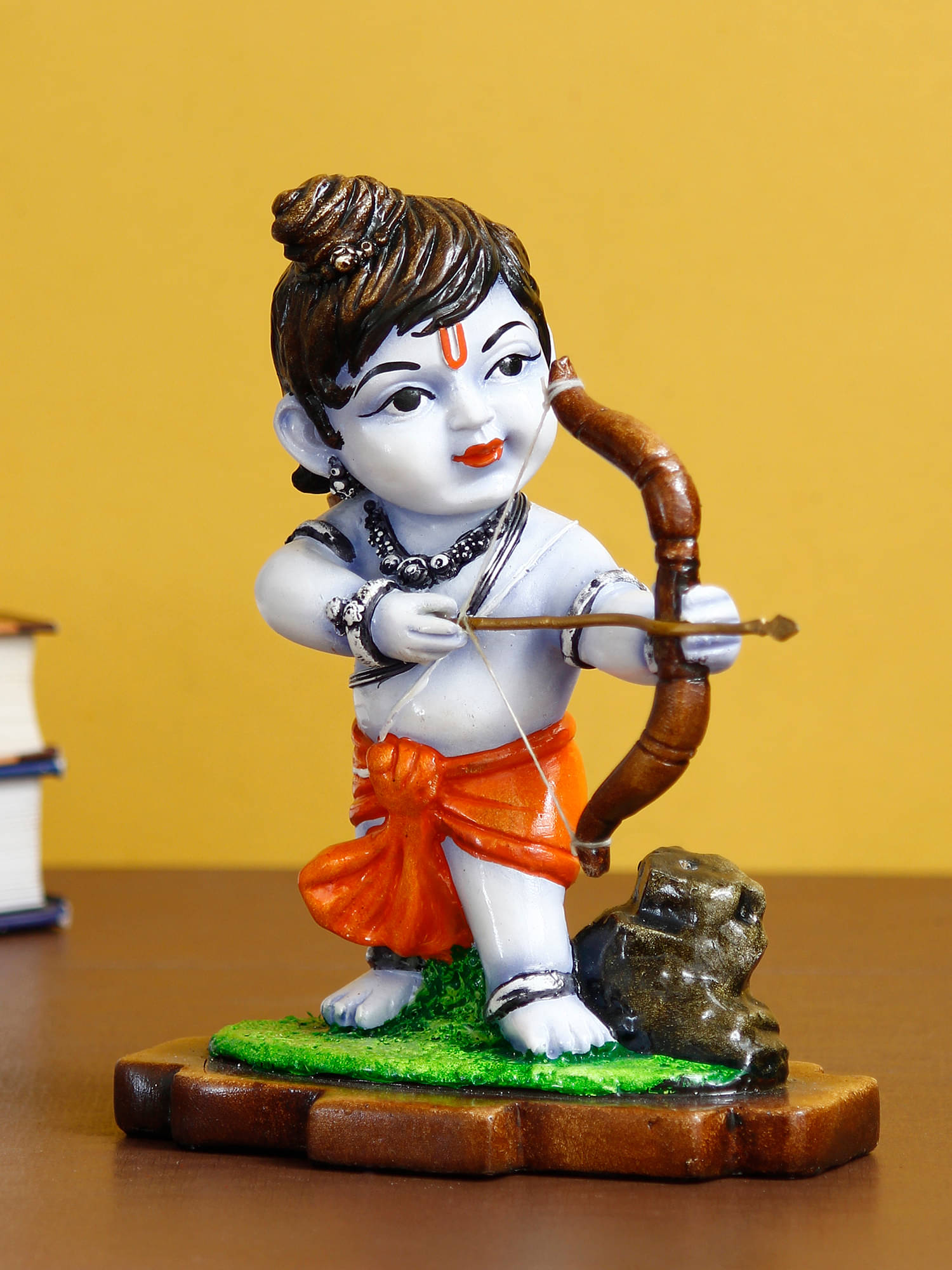eCraftIndia Orange & Blue Lord Ram Playing with Bow & Arrow Handcrafted Figurine Showpiece     			eCraftIndia Orange & Blue Lord Ram Playing with Bow & Arrow Handcrafted Figurine Showpiece