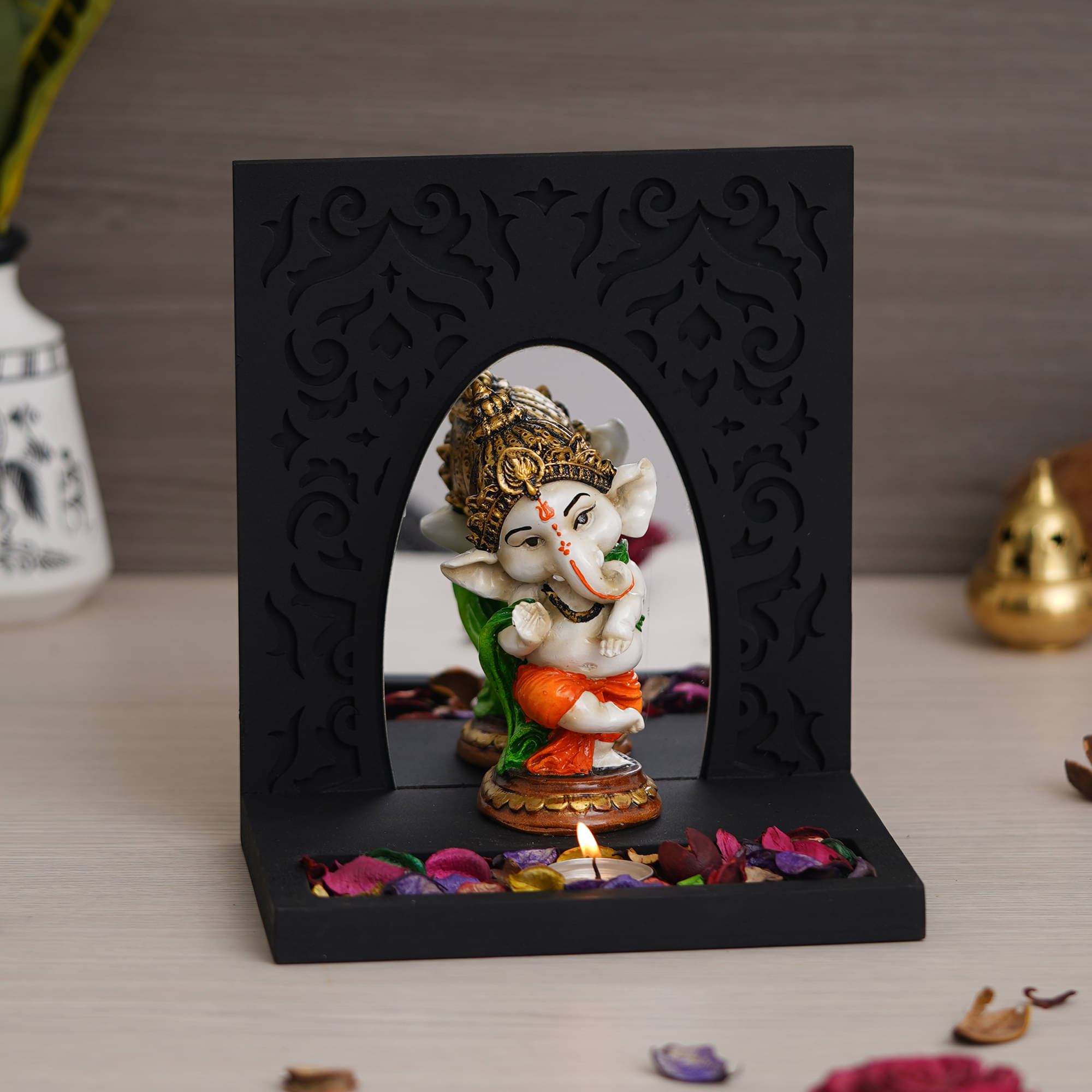     			eCraftIndia Black & Orange Ganesha Showpiece With Tea Light Holder