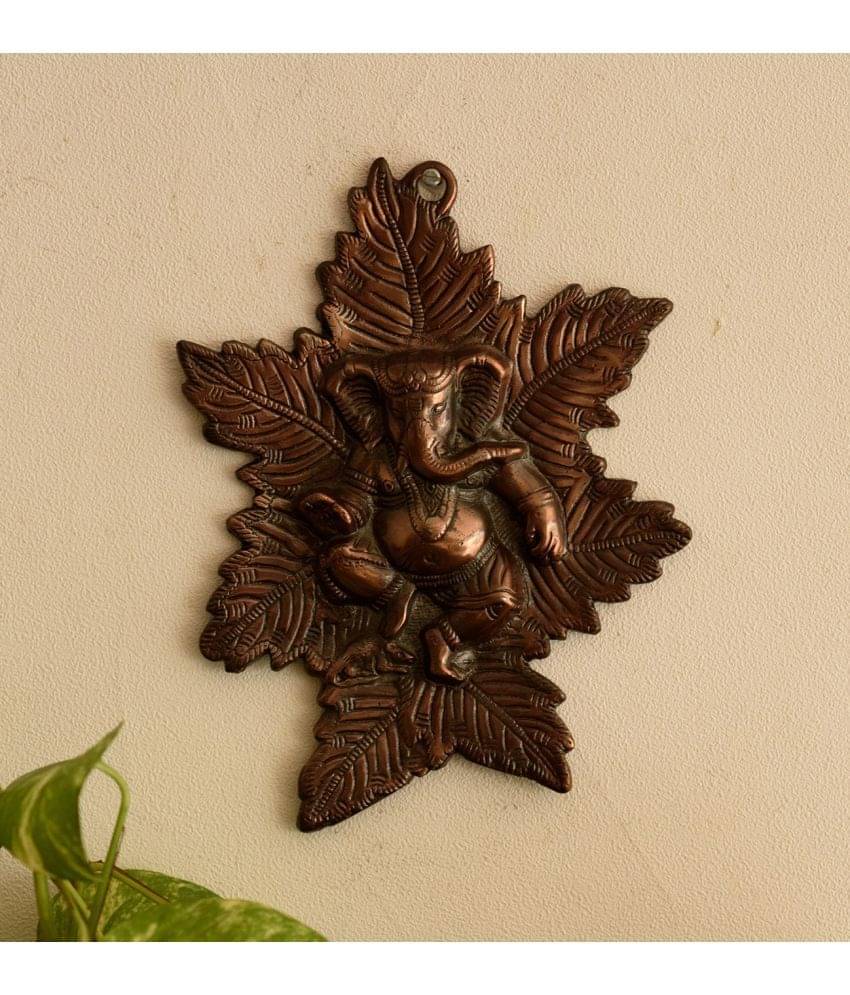 eCraftIndia Metal wall hanging of Lord Ganesha on Maple Leaf eCraftIndia Metal wall hanging of Lord Ganesha on Maple Leaf