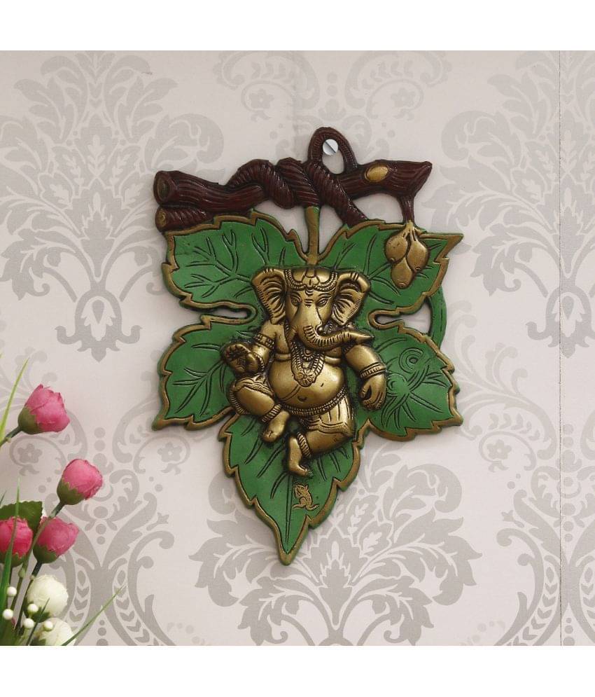 eCraftIndia Green & Golden Dancing Lord Ganesha on Leaf Metal Wall Hanging eCraftIndia Green & Golden Dancing Lord Ganesha on Leaf Metal Wall Hanging