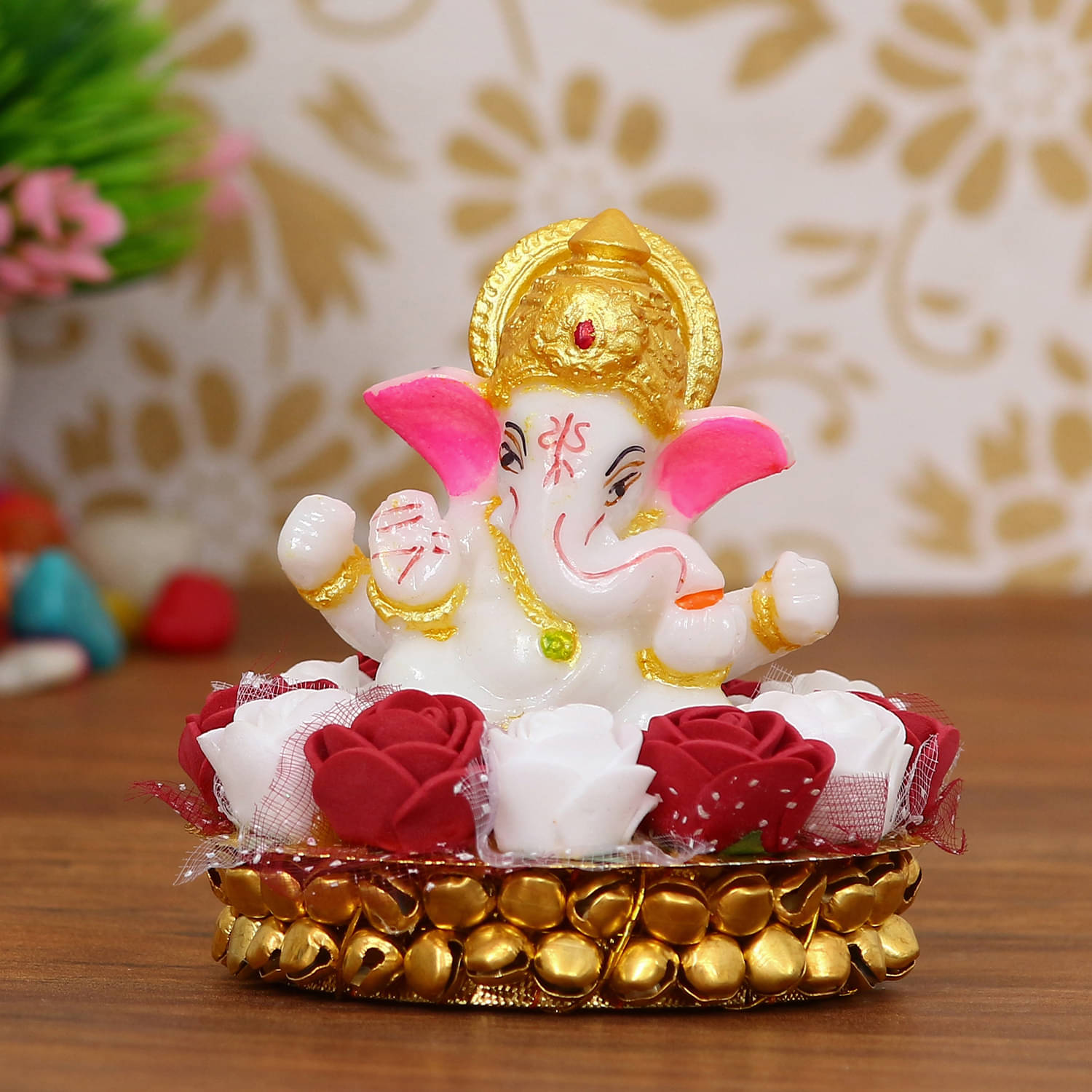 eCraftIndia White & Gold-Toned Handcrafted Lord Ganesha Idol on Decorated Plate     			eCraftIndia White & Gold-Toned Handcrafted Lord Ganesha Idol on Decorated Plate