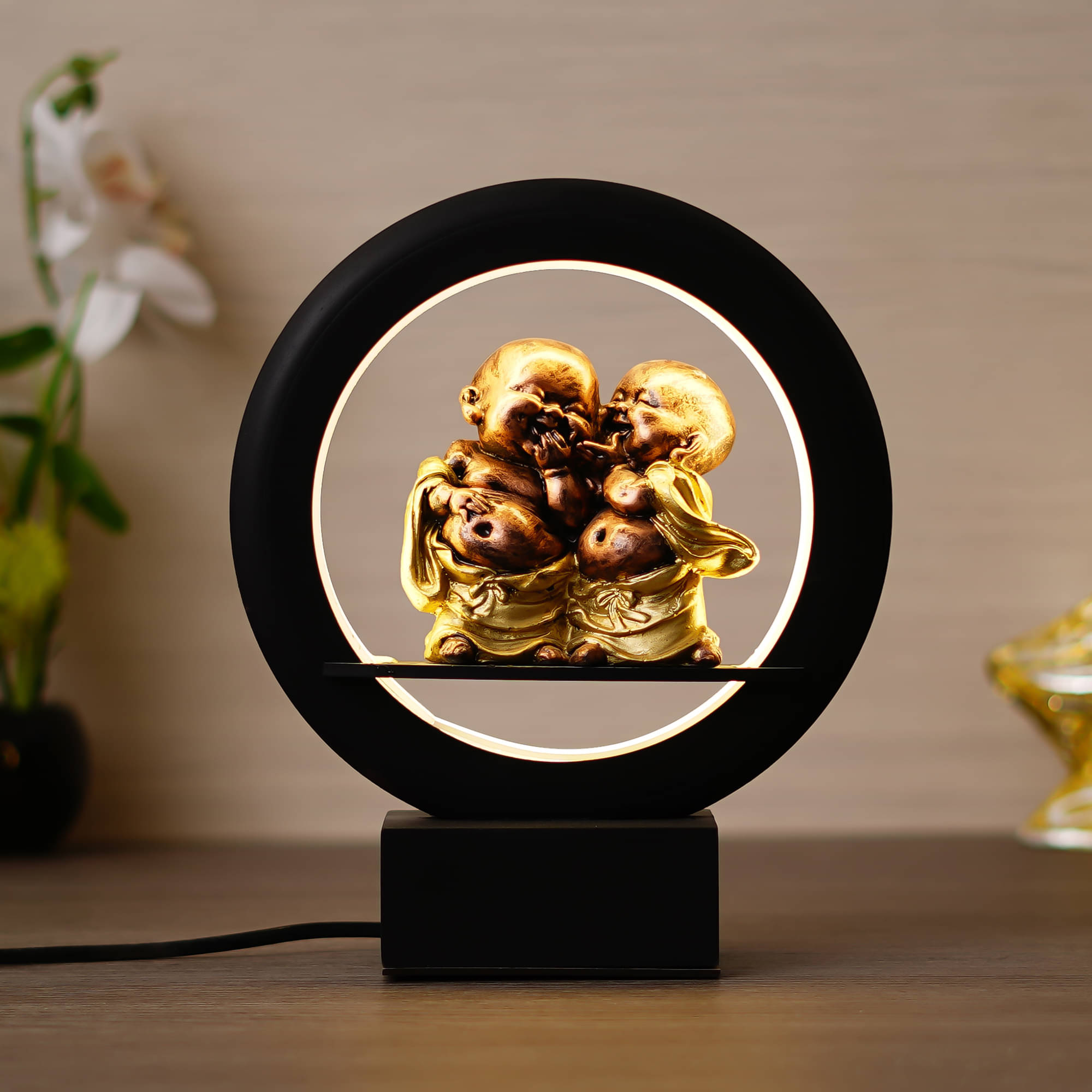 eCraftIndia Black & Gold Laughing Buddha Monk Decorative Circular Table Lamp eCraftIndia Black & Gold Laughing Buddha Monk Decorative Circular Table Lamp