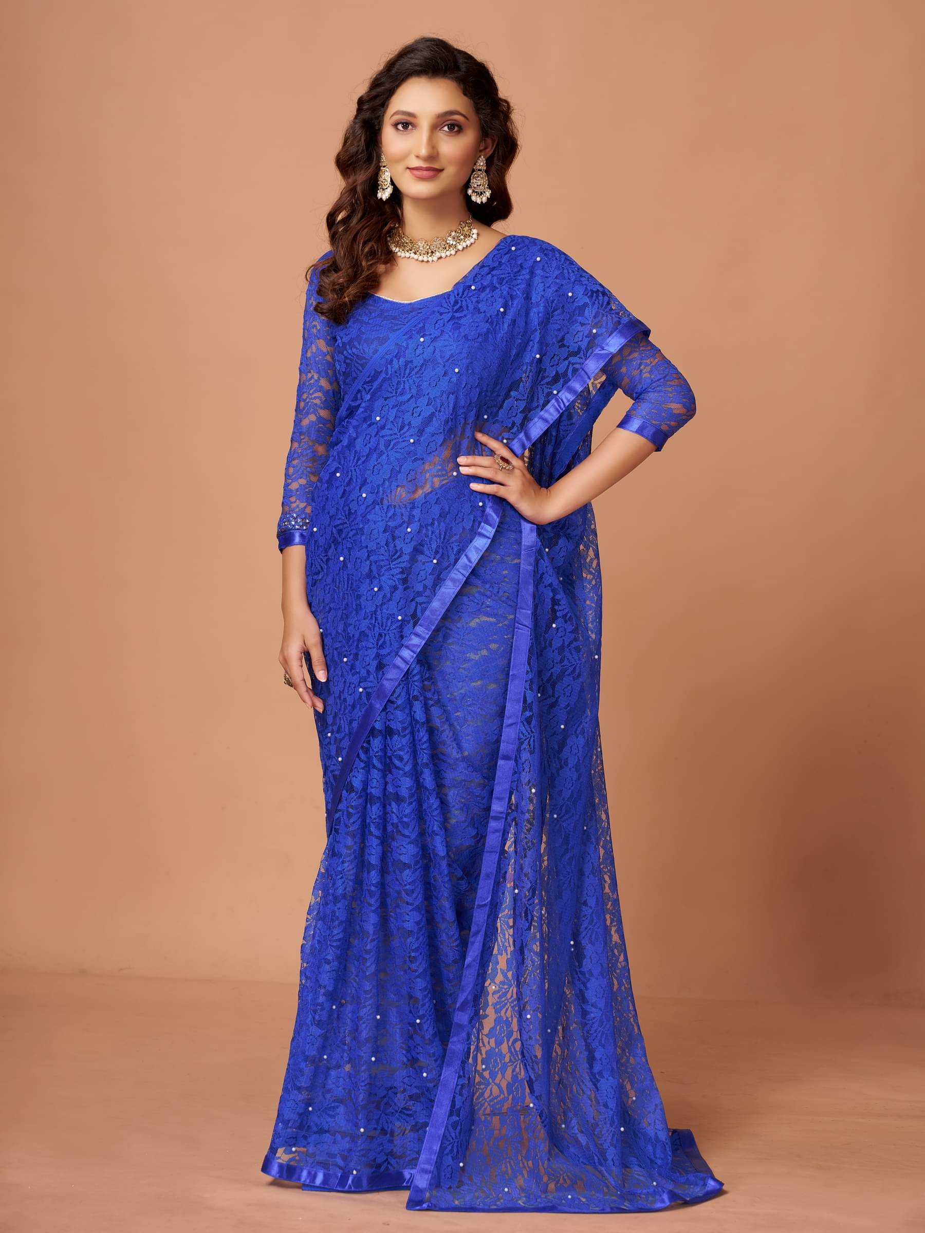 VANRAJ CREATION Brasso Self Design Saree With Unstitched Blouse Piece ( Blue )     			VANRAJ CREATION Brasso Self Design Saree With Unstitched Blouse Piece ( Blue )