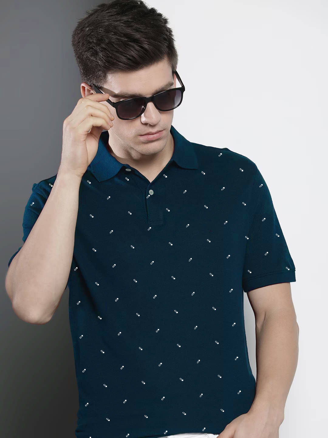 Merriment Pack of 1 Cotton Blend Regular Fit Printed Half Sleeves Men's Polo T Shirt ( Indigo )     			Merriment Pack of 1 Cotton Blend Regular Fit Printed Half Sleeves Men's Polo T Shirt ( Indigo )