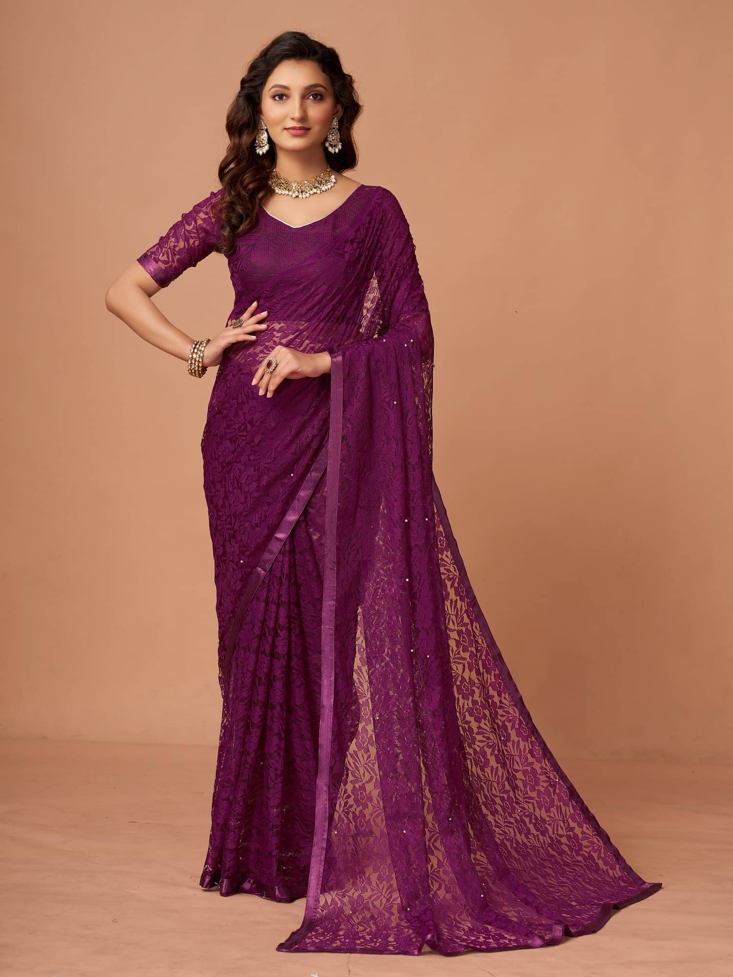     			VERVIZA Net Printed Saree Without Blouse Piece ( Wine )