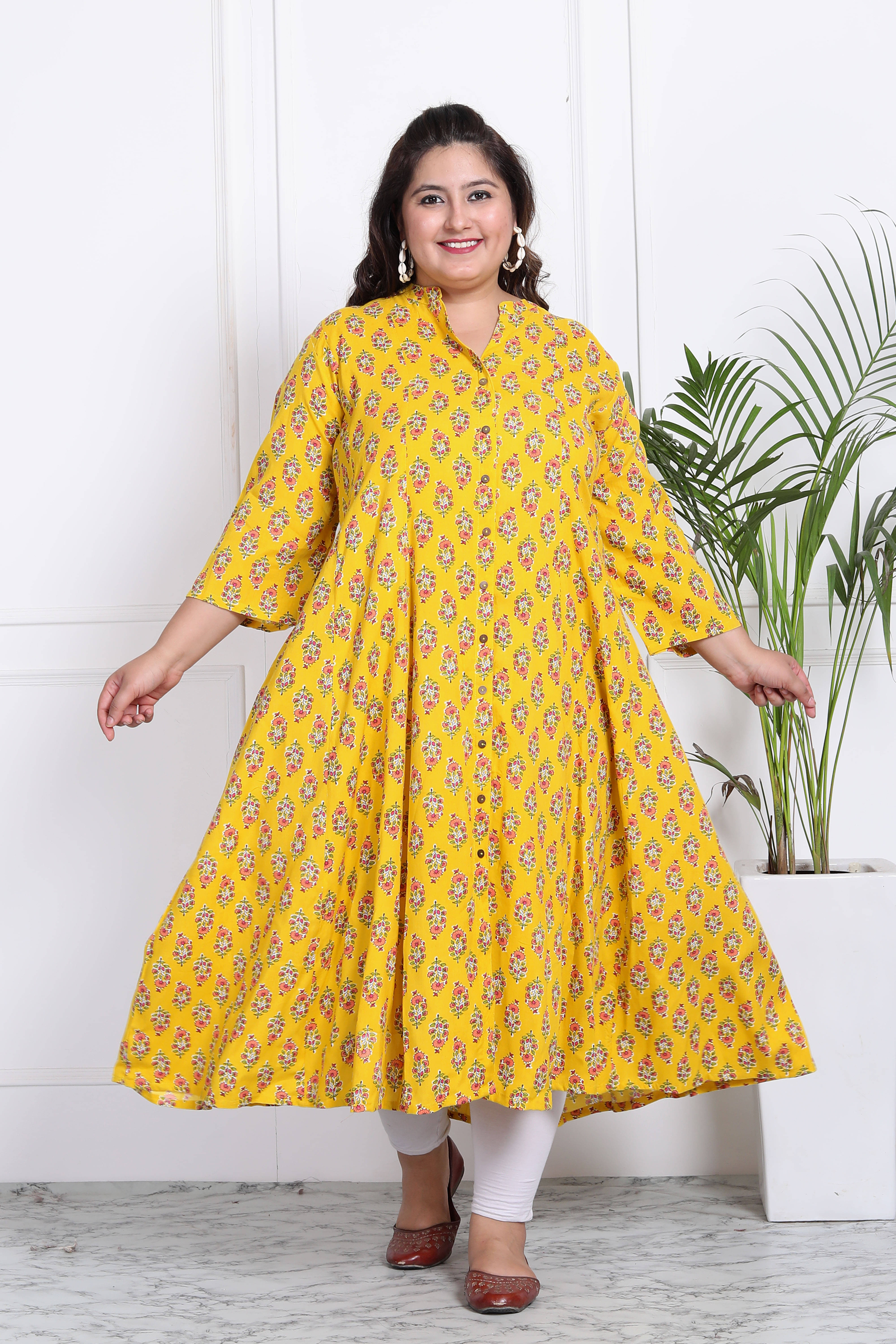 Swasti Cotton Blend Printed Flared Women's Kurti - Yellow ( Pack of 1 ) Swasti Cotton Blend Printed Flared Women's Kurti - Yellow ( Pack of 1 )