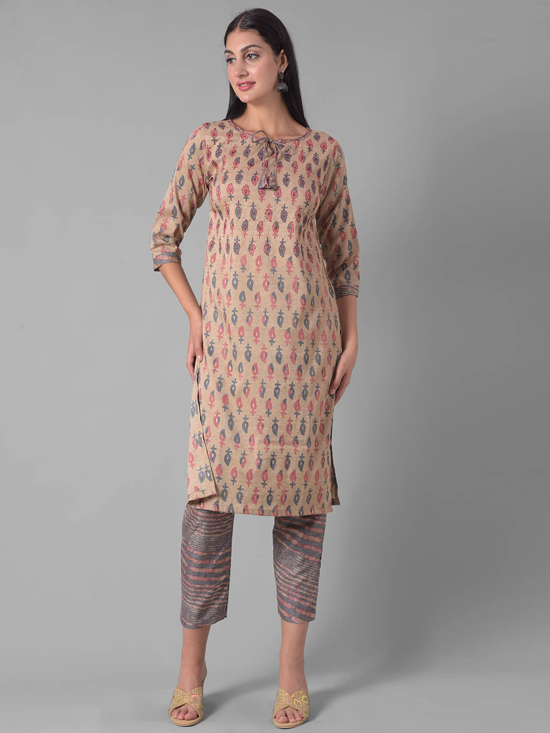 Dollar Missy Cotton Blend Self Design Straight Women's Kurti - Beige ( Pack of 1 ) Dollar Missy Cotton Blend Self Design Straight Women's Kurti - Beige ( Pack of 1 )