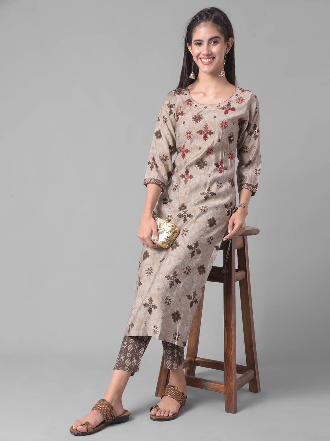 Dollar Missy Cotton Blend Self Design Straight Women's Kurti - Brown ( Pack of 1 ) Dollar Missy Cotton Blend Self Design Straight Women's Kurti - Brown ( Pack of 1 )