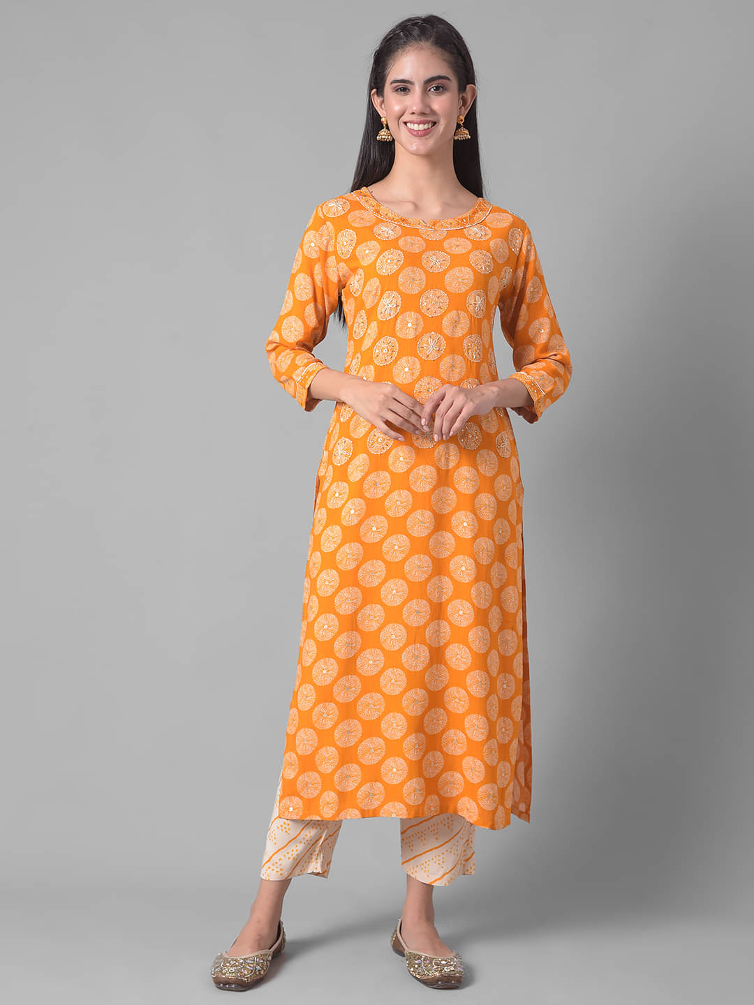 Dollar Missy Cotton Blend Self Design Straight Women's Kurti - Yellow ( Pack of 1 )     			Dollar Missy Cotton Blend Self Design Straight Women's Kurti - Yellow ( Pack of 1 )