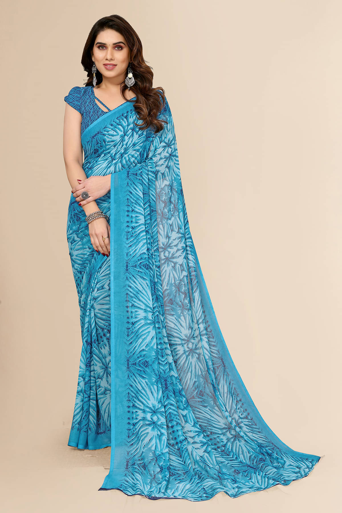 Kashvi Sarees Georgette Printed Saree With Unstitched Blouse Piece ( Blue )     			Kashvi Sarees Georgette Printed Saree With Unstitched Blouse Piece ( Blue )