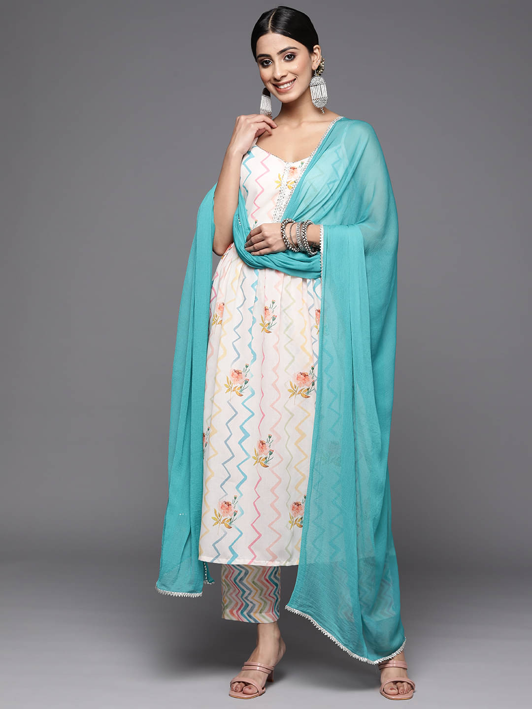 Varanga Cotton Blend Printed Kurti With Pants Women's Stitched Salwar Suit - Off White ( Pack of 1 ) Varanga Cotton Blend Printed Kurti With Pants Women's Stitched Salwar Suit - Off White ( Pack of 1 )