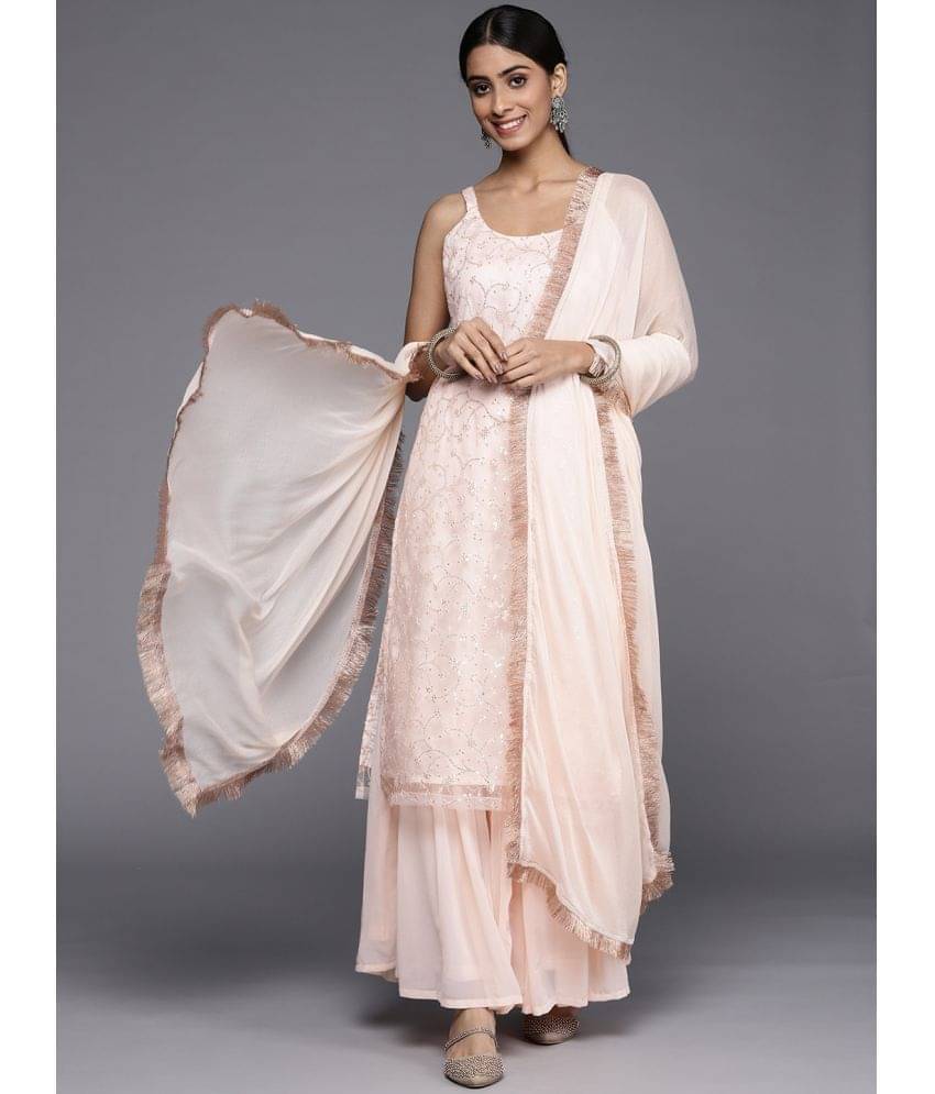 Varanga Net Embroidered Kurti With Pants Women's Stitched Salwar Suit - Peach ( Pack of 1 ) Varanga Net Embroidered Kurti With Pants Women's Stitched Salwar Suit - Peach ( Pack of 1 )