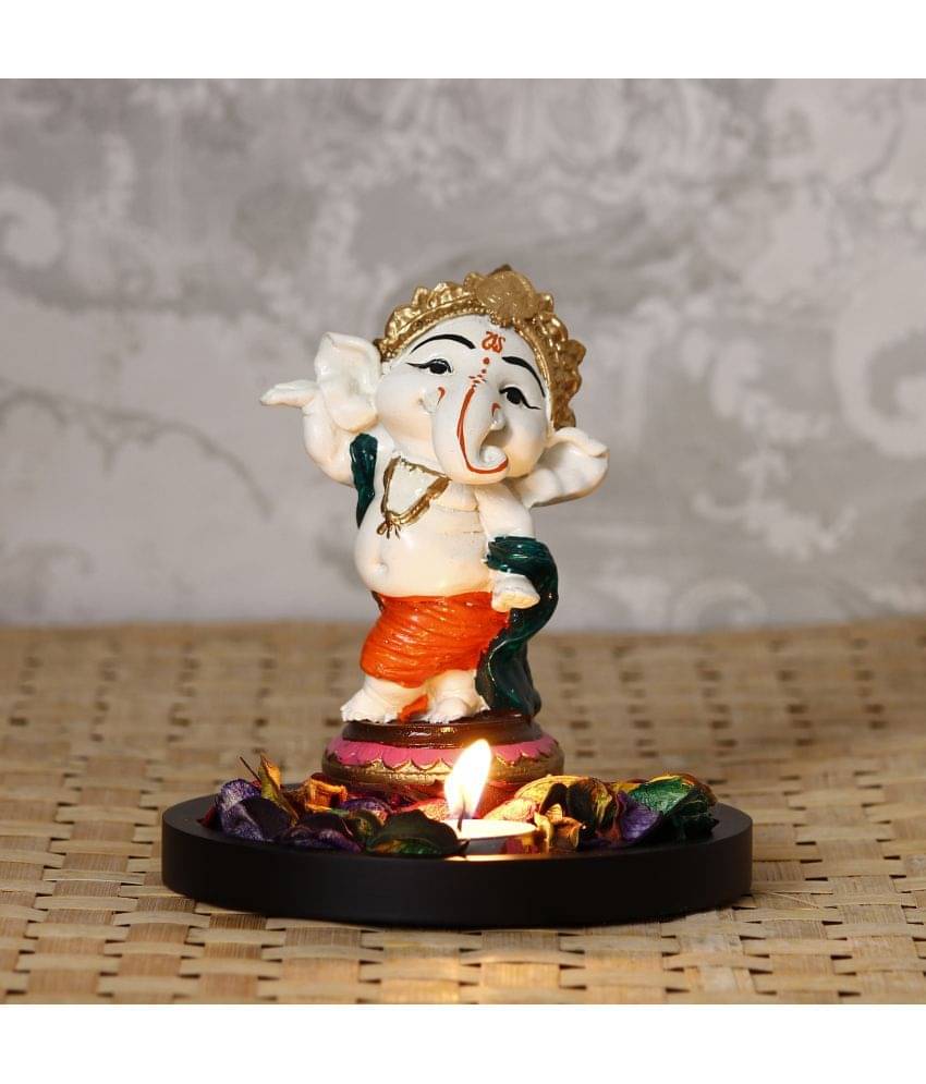 eCraftIndia Off-White & Orange Lord Ganesha Dancing Avatar Showpiece With Wooden Base, Petals & Tealight eCraftIndia Off-White & Orange Lord Ganesha Dancing Avatar Showpiece With Wooden Base, Petals & Tealight
