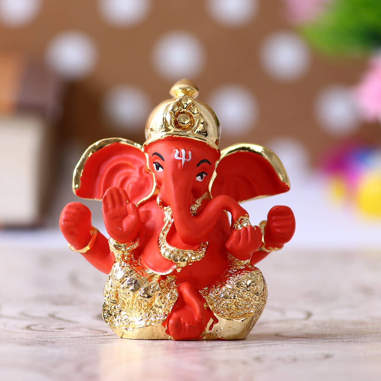 eCraftIndia Gold Toned & Orange Handcrafted Dhoti Ganesha Decorative Showpiece eCraftIndia Gold Toned & Orange Handcrafted Dhoti Ganesha Decorative Showpiece