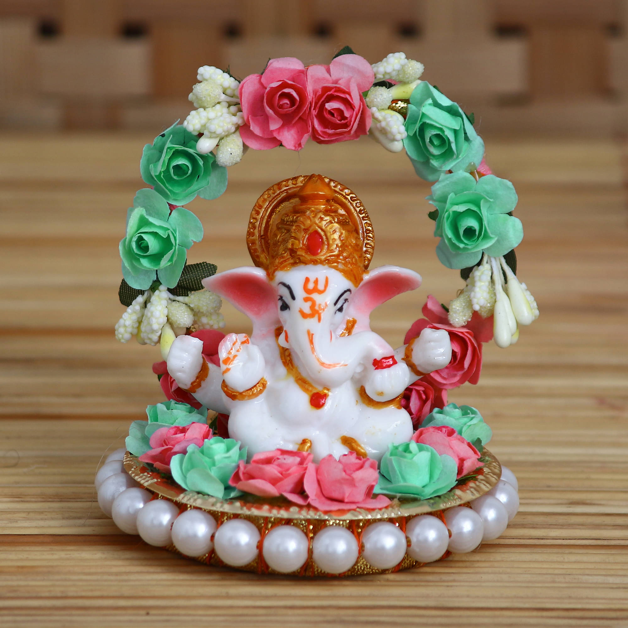 eCraftIndia White & Green Handcrafted Lord Ganesha On Decorative Plate With Throne Of Flowers Showpiece     			eCraftIndia White & Green Handcrafted Lord Ganesha On Decorative Plate With Throne Of Flowers Showpiece