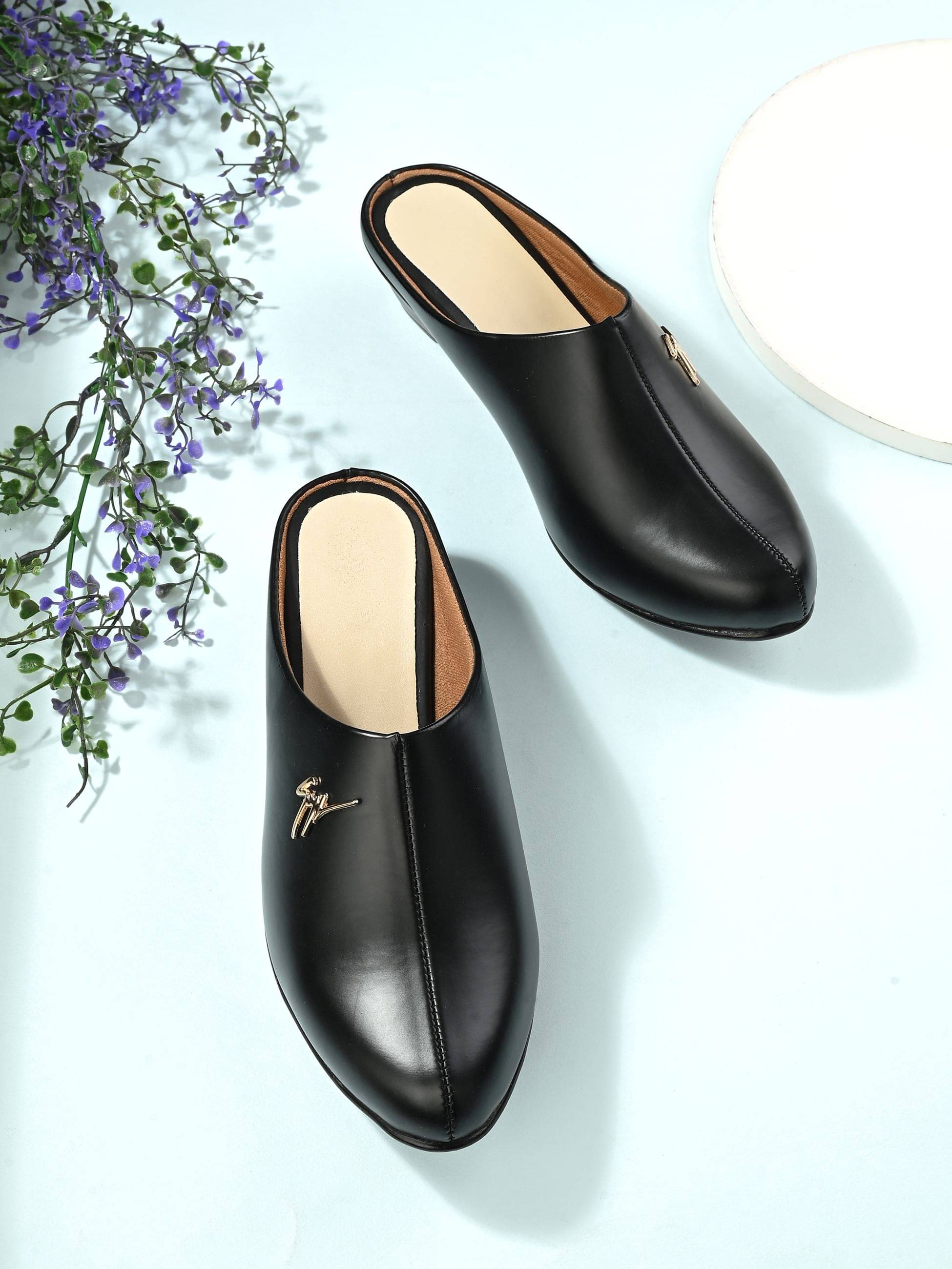     			Footloose Black Women's Mules