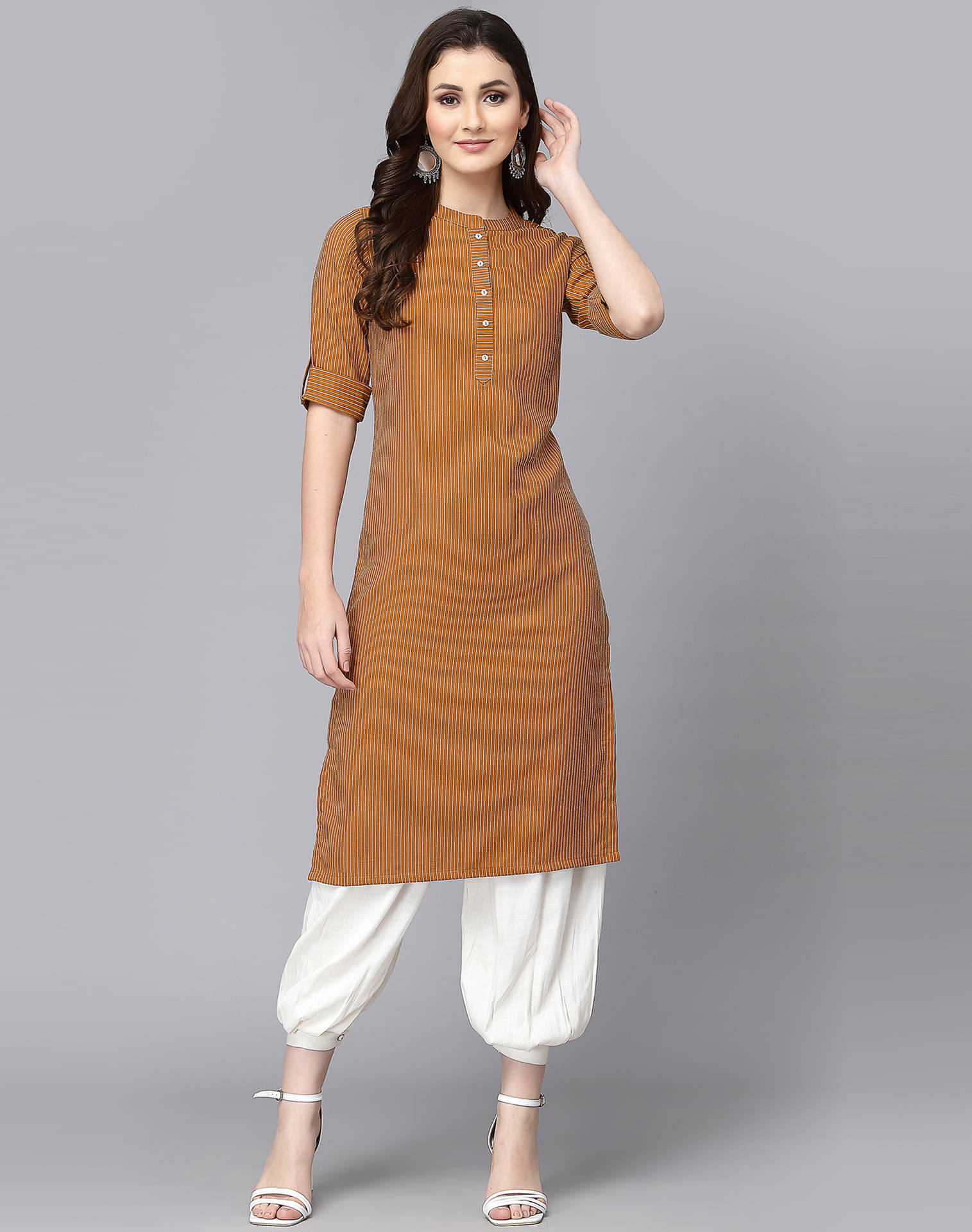     			Skylee Cotton Self Design A-line Women's Kurti - Mustard ( Pack of 1 )