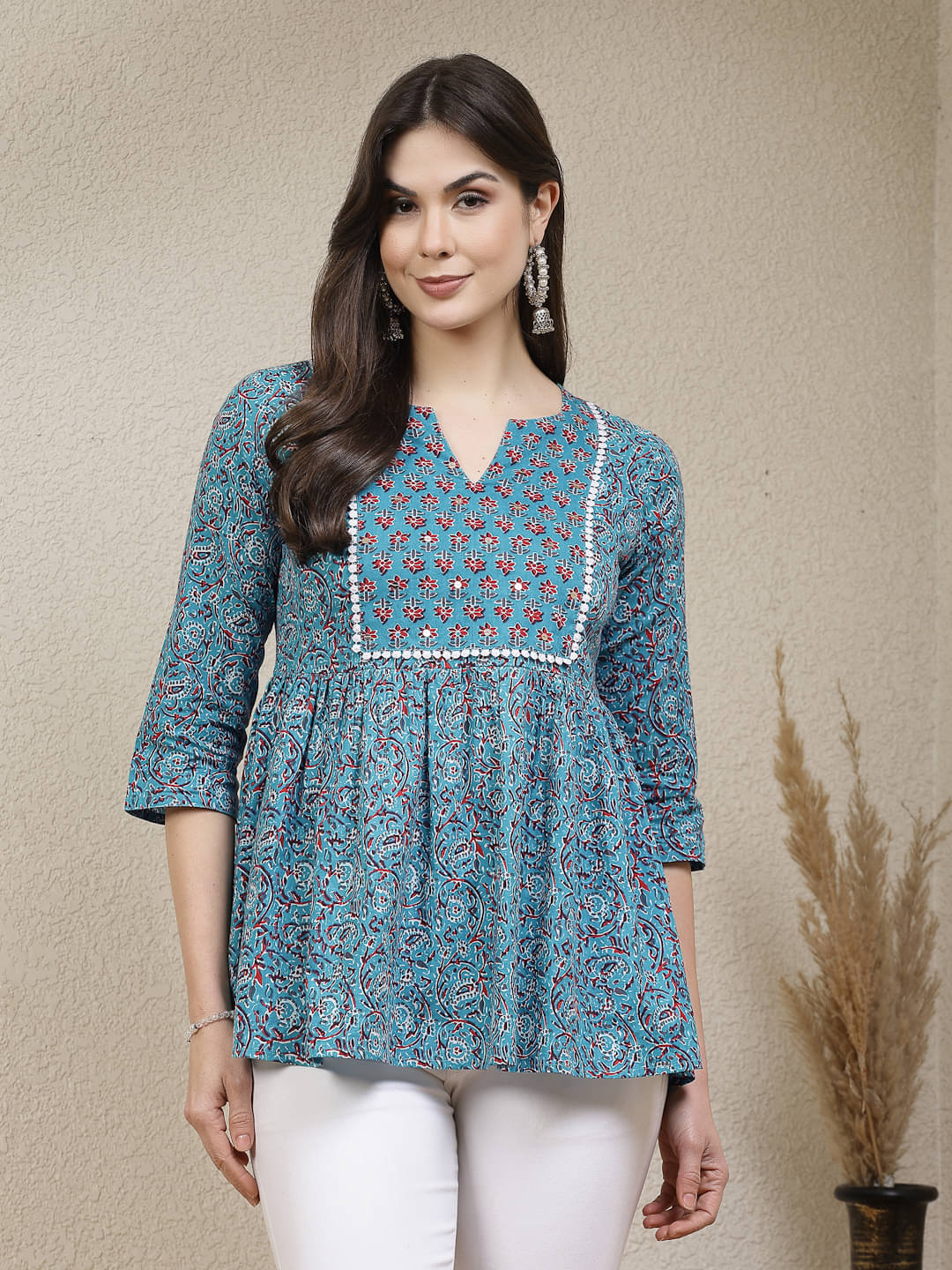     			Stylum Turquoise Cotton Women's Peplum Top ( Pack of 1 )