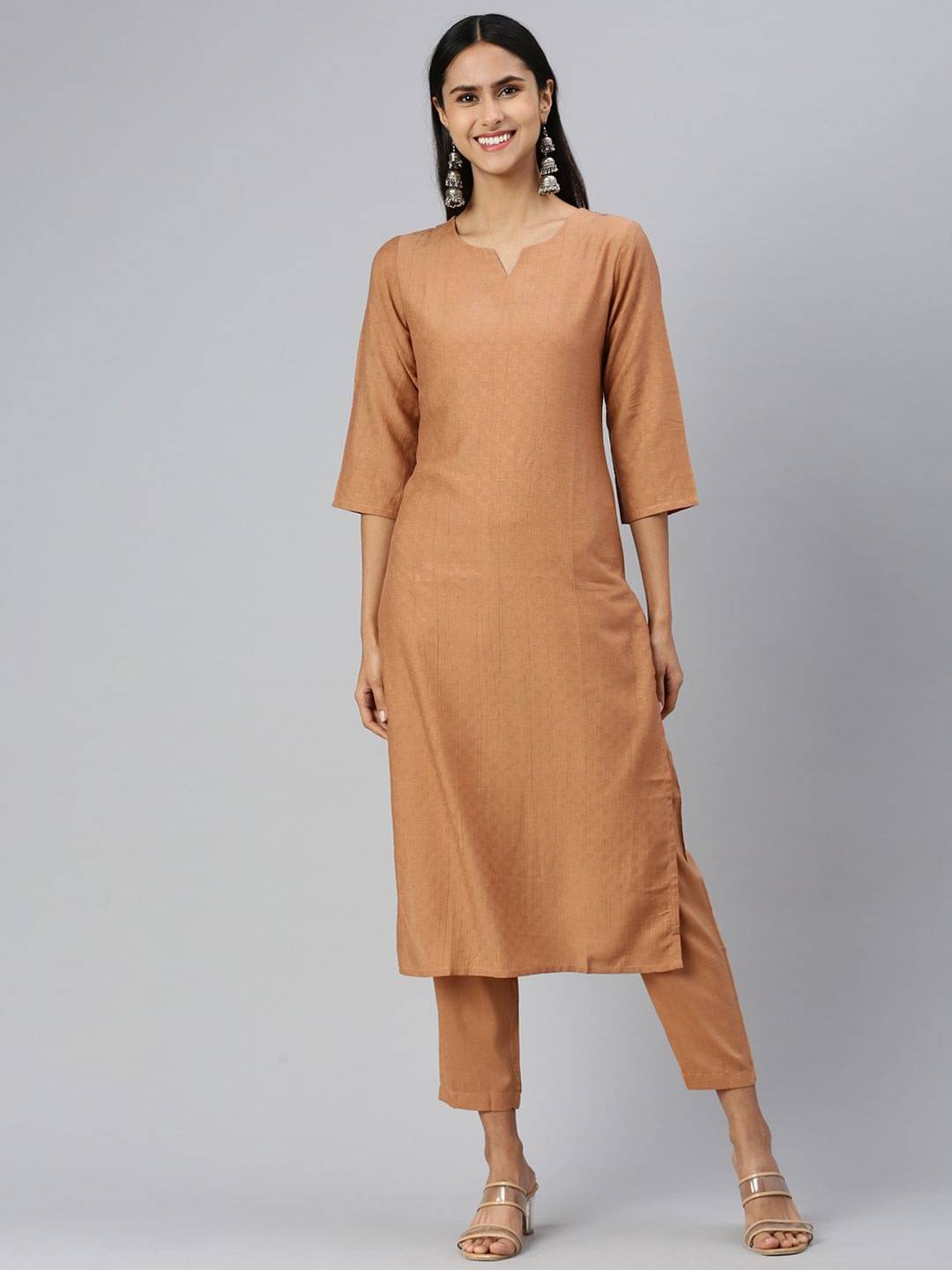 Hritika Cotton Solid Kurti With Pants Women's Stitched Salwar Suit - Brown ( Pack of 1 ) Hritika Cotton Solid Kurti With Pants Women's Stitched Salwar Suit - Brown ( Pack of 1 )