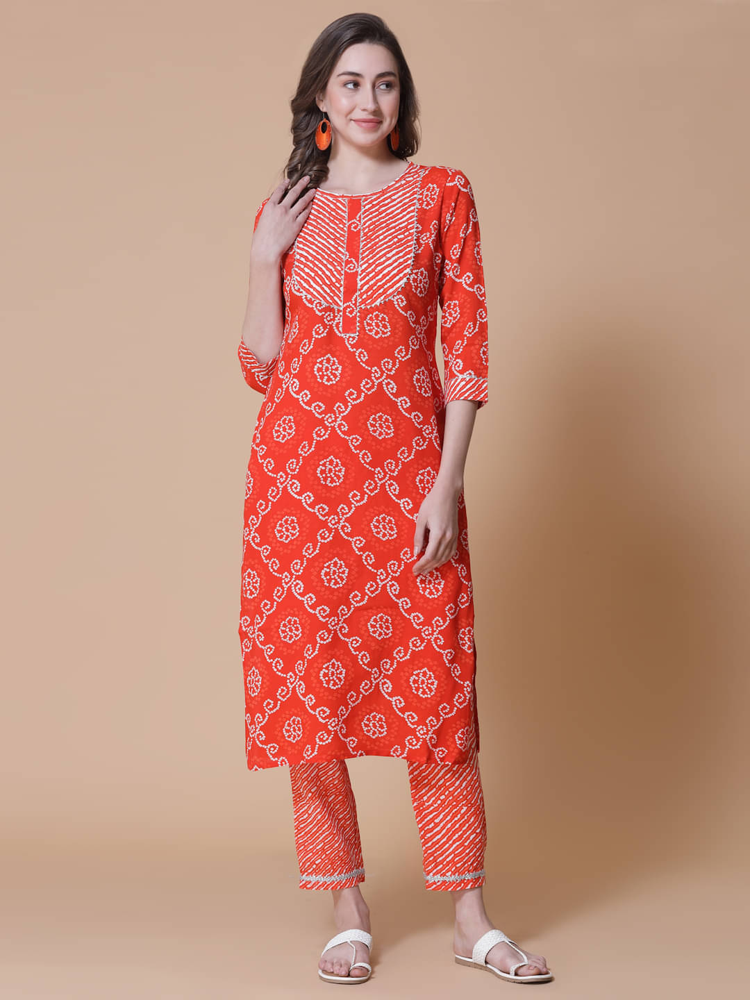 GOD BLESS Rayon Printed Kurti With Pants Women's Stitched Salwar Suit - Orange ( Pack of 1 )     			GOD BLESS Rayon Printed Kurti With Pants Women's Stitched Salwar Suit - Orange ( Pack of 1 )